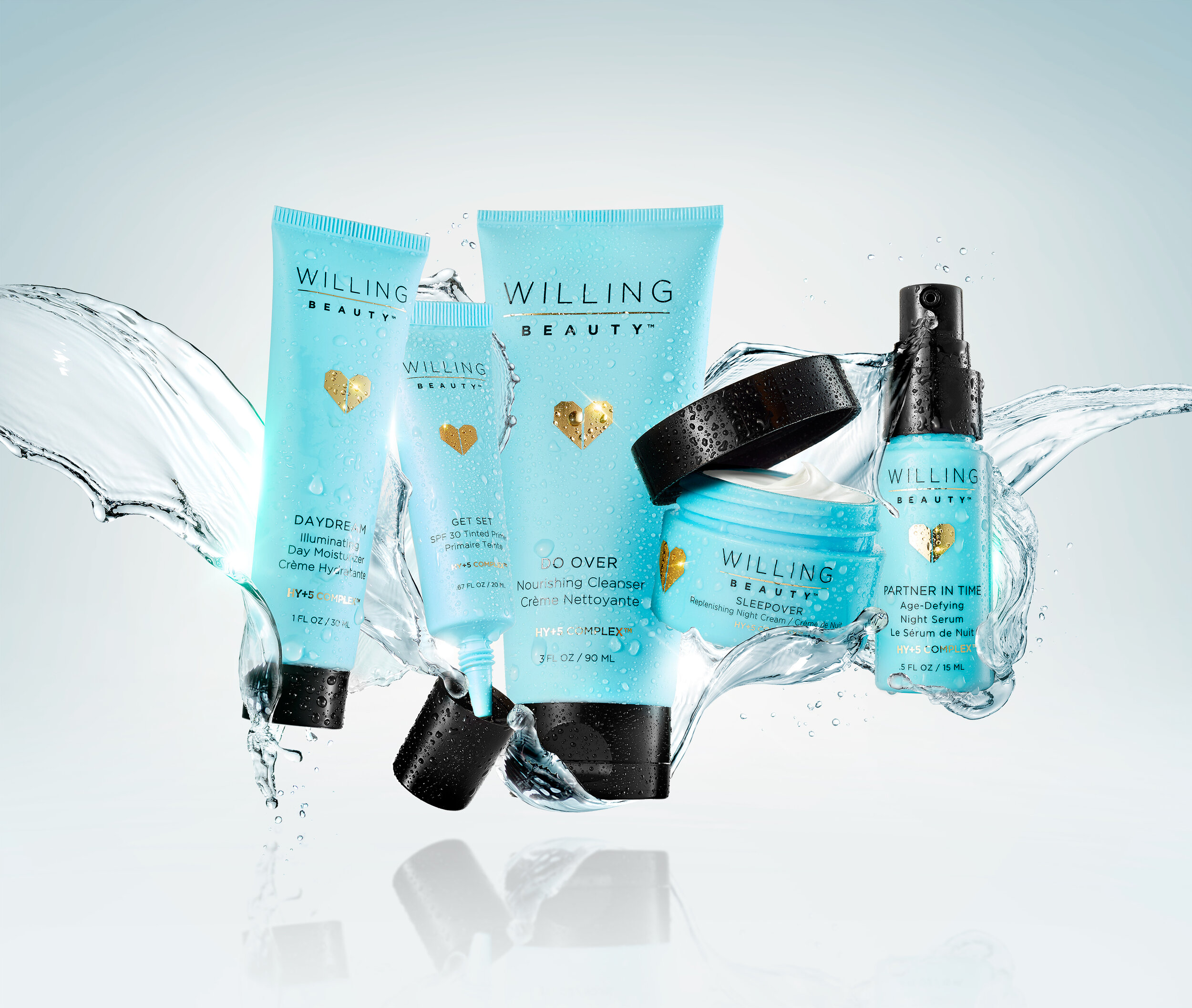 Willing Beauty skincare product range with blue packaging and water splash.