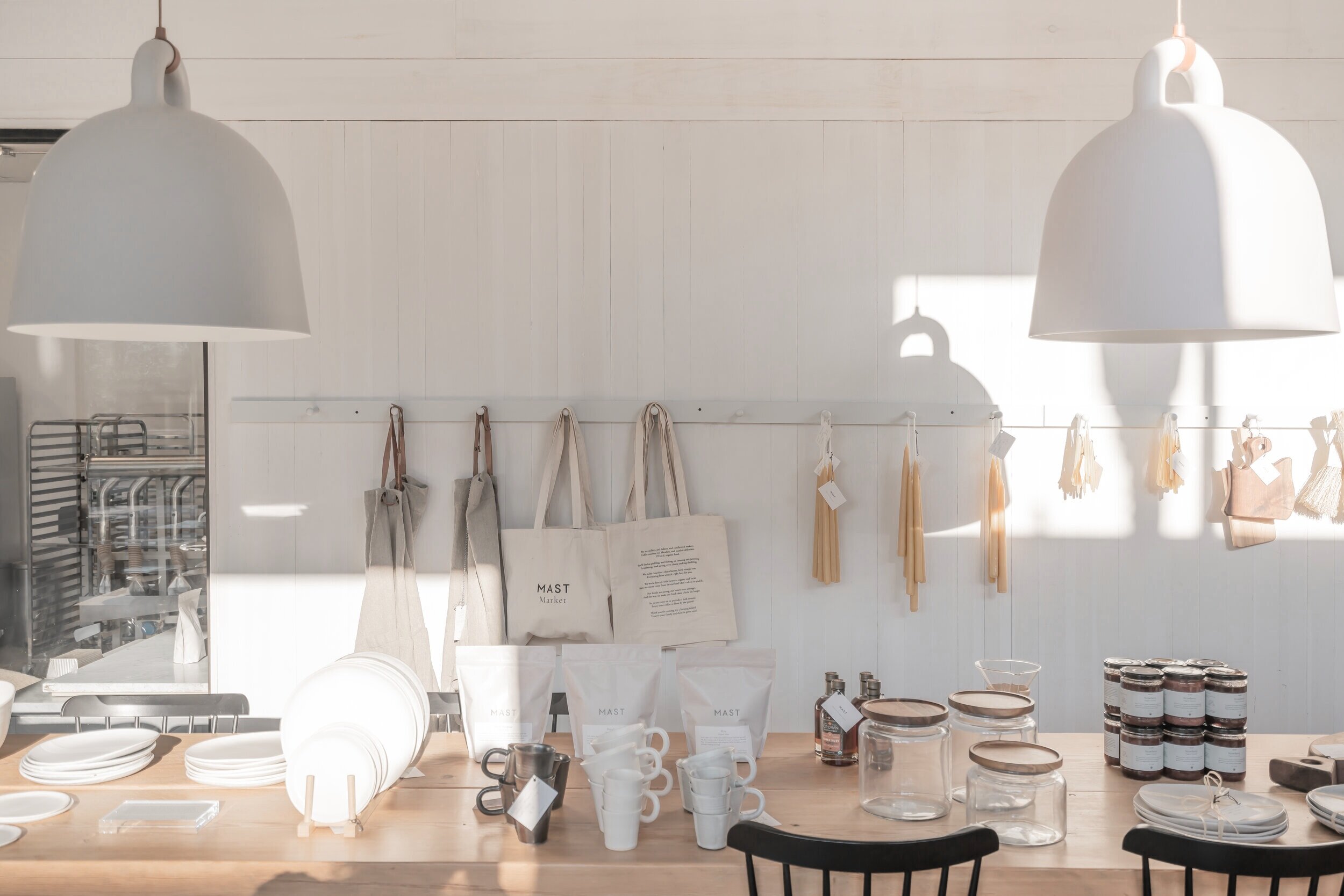 Mast Market products displayed on farmhouse table.