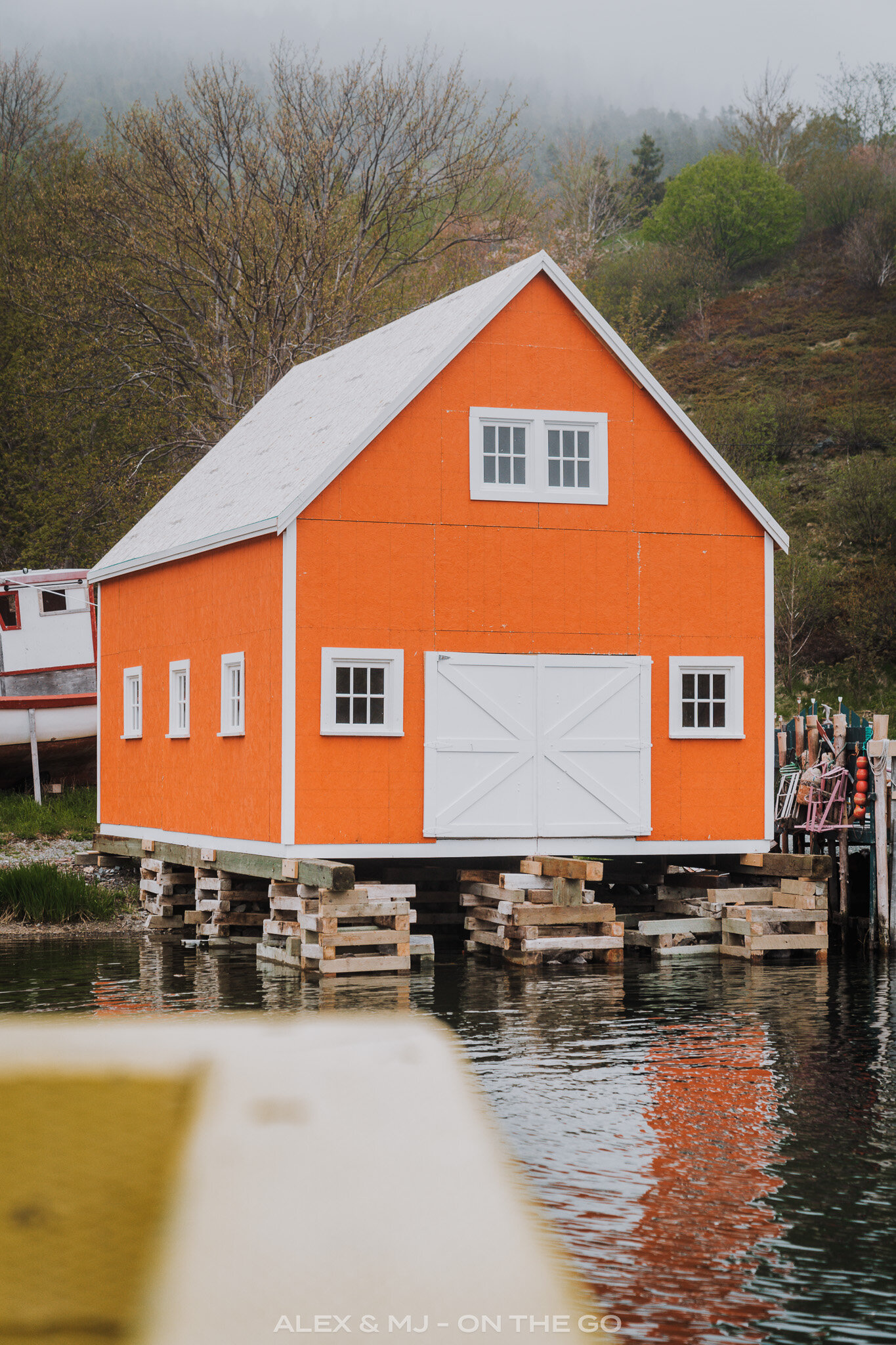 Alex-MJ-On-the-GO-Quidi-Vidi-Brewery-Terre-Neuve-garage-orange.jpg