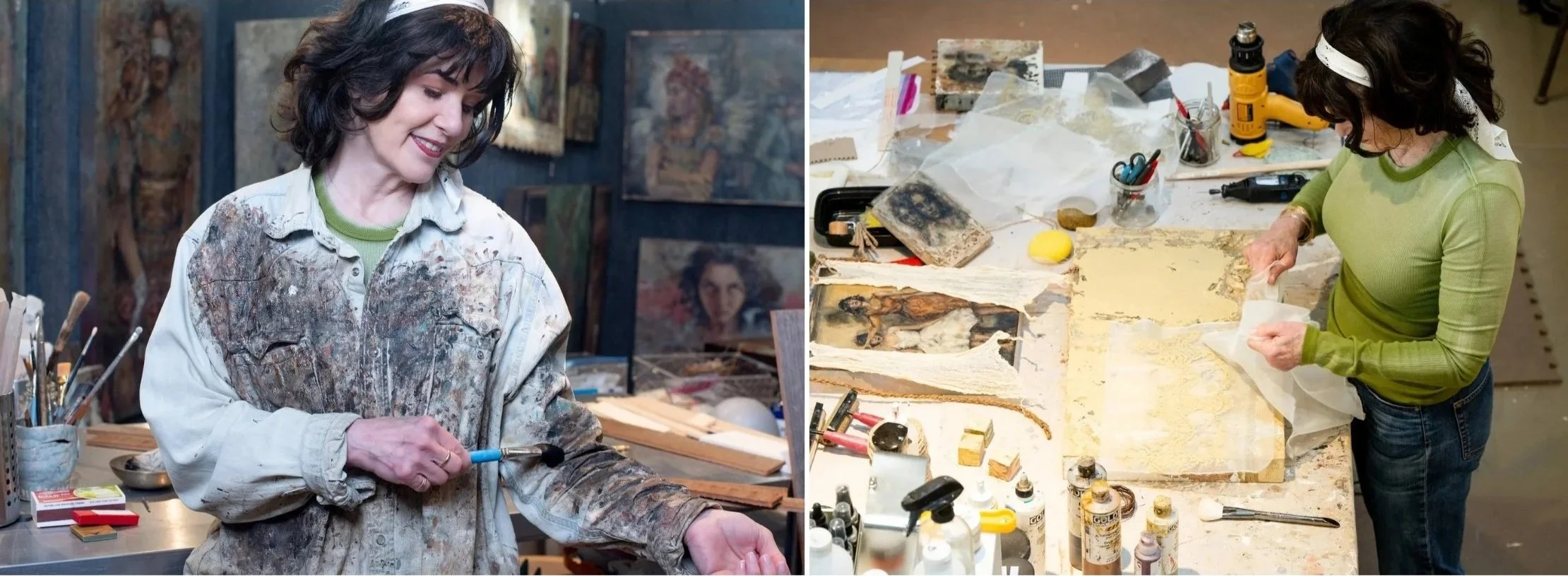 A woman working in her art studio, wearing a green long-sleeve shirt and a white headband, handling a piece of artwork on a worktable covered in art supplies and tools.