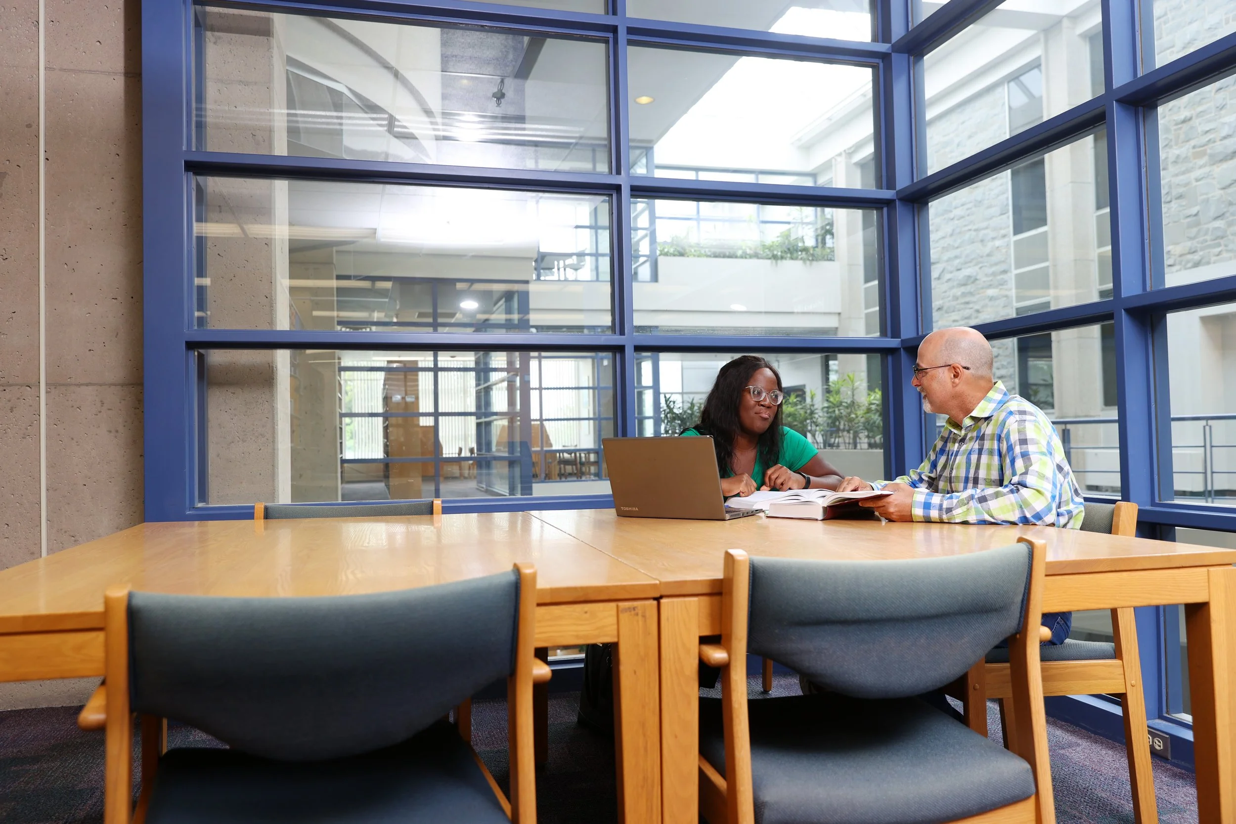 pg. 10 11 spread Faculty Eni and Mike.jpg