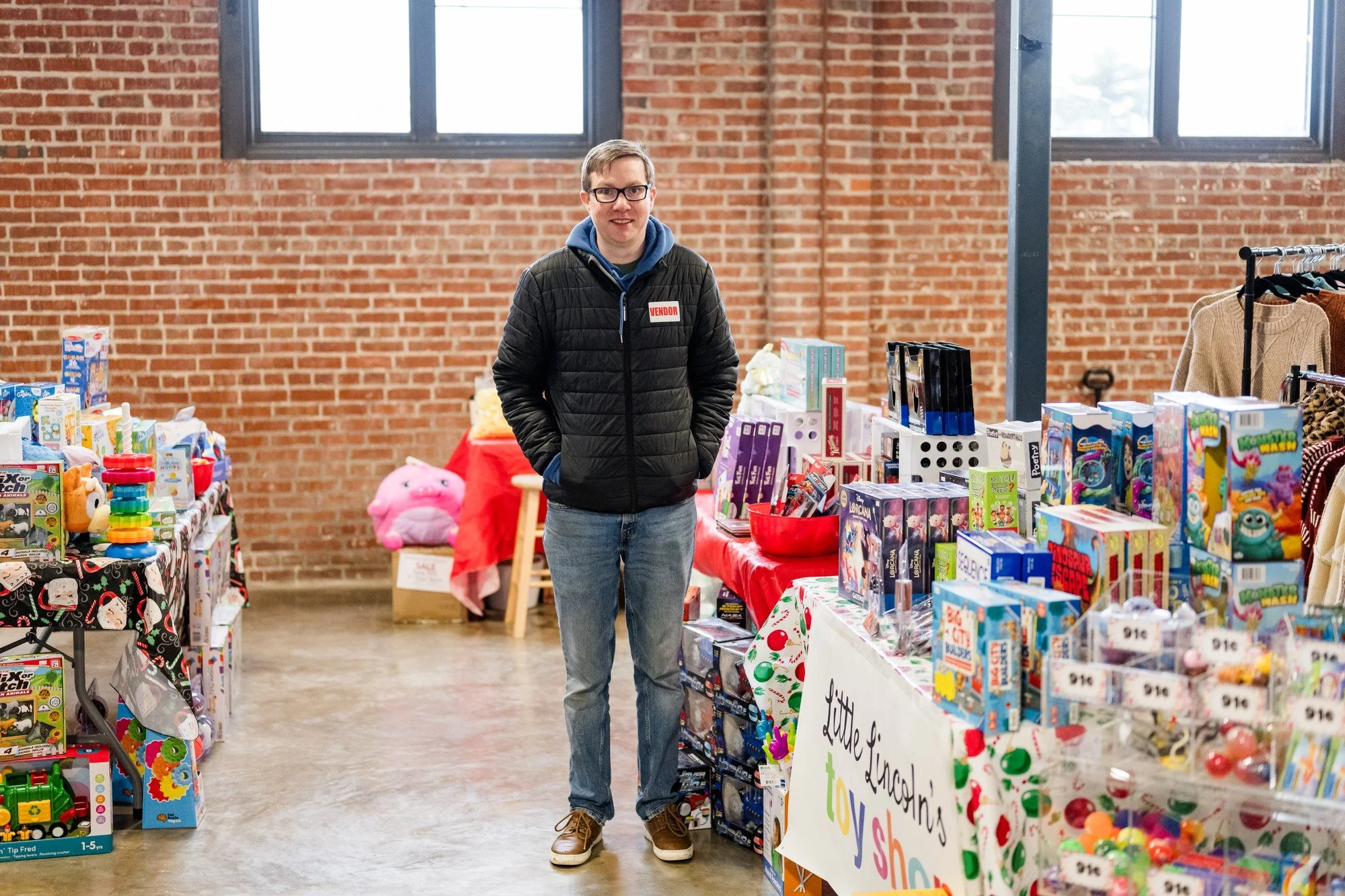 Ryan Leake, owner of Little Lincoln's Toy Shop, at his booth at the Illinois Local Holiday Market in Springfield, ILRyan Leake, owner of Little Lincoln's Toy Shop, at his booth at the Illinois Local Holiday Market in Springfield, IL