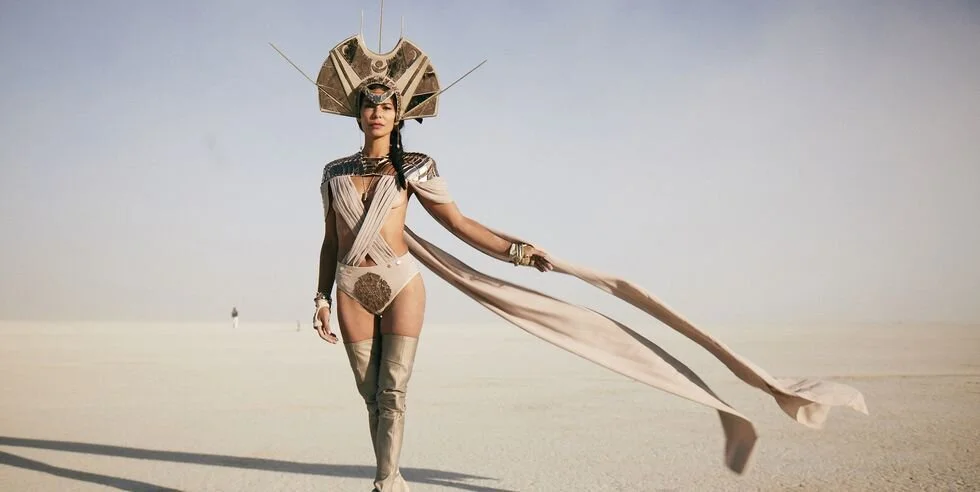 Scarlett in ceremonial dress on the Burning Man playa