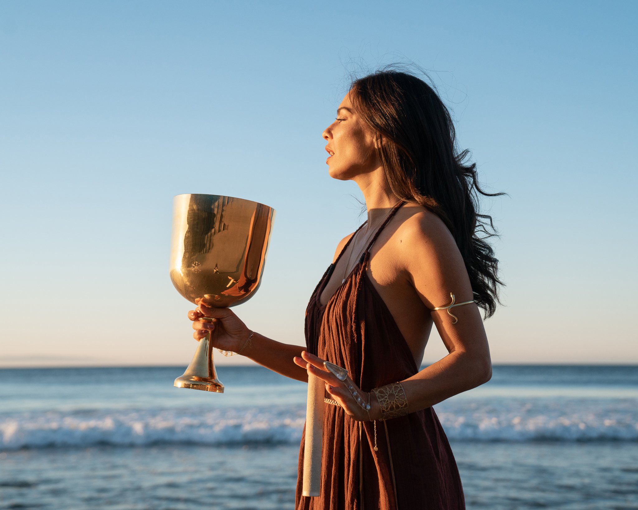 Scarlett with the chalice on the beach
