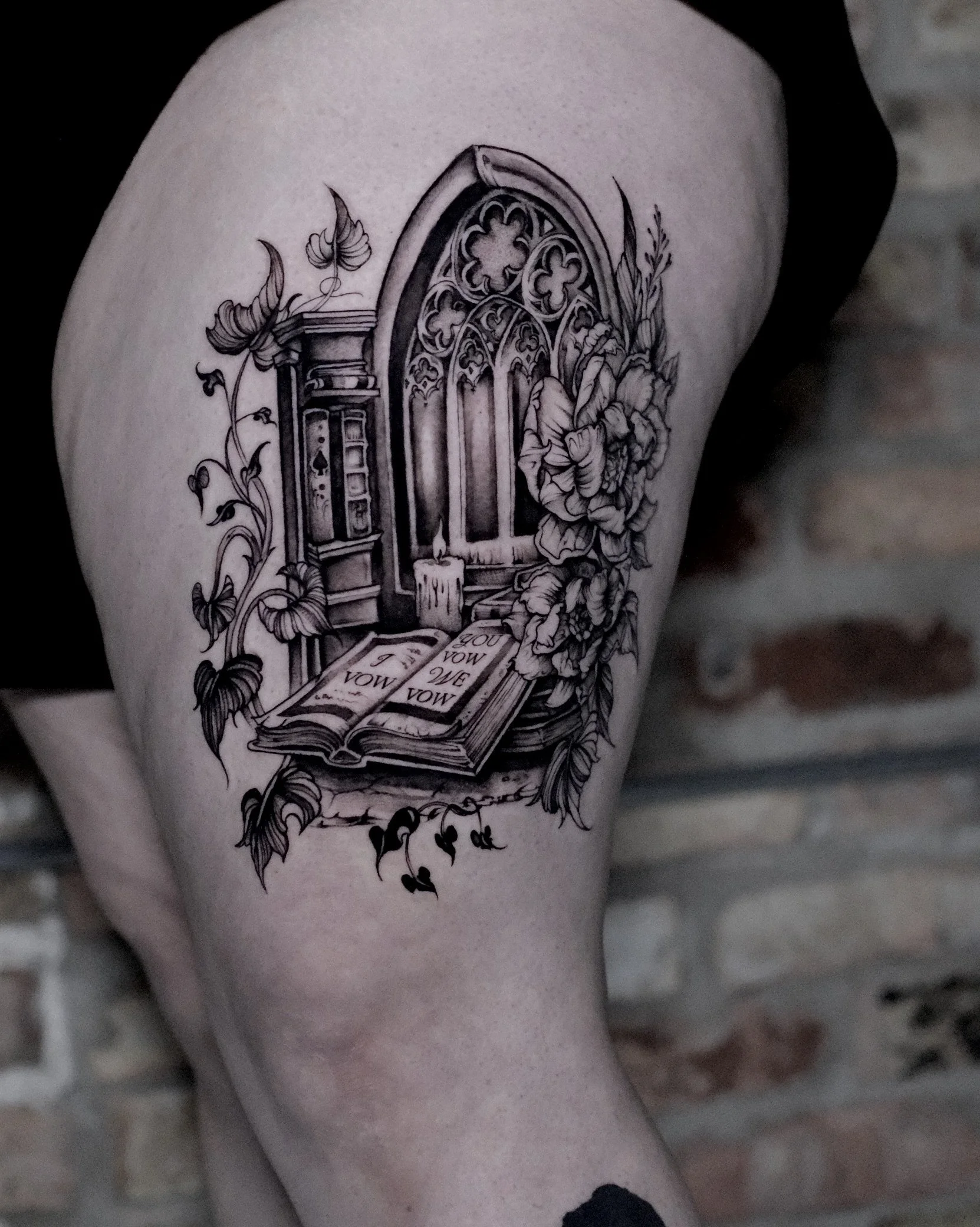 Gothic architecture window with a book theme.  Books, florals and candles with vines framing it. Gothic book tattoo design 