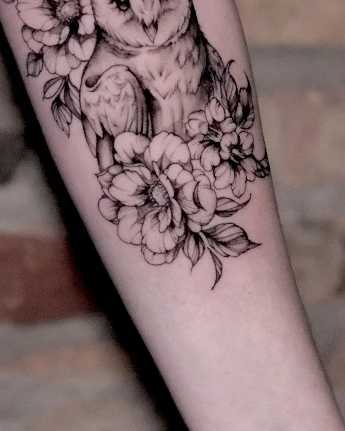 fine line owl tattoo with flowers 