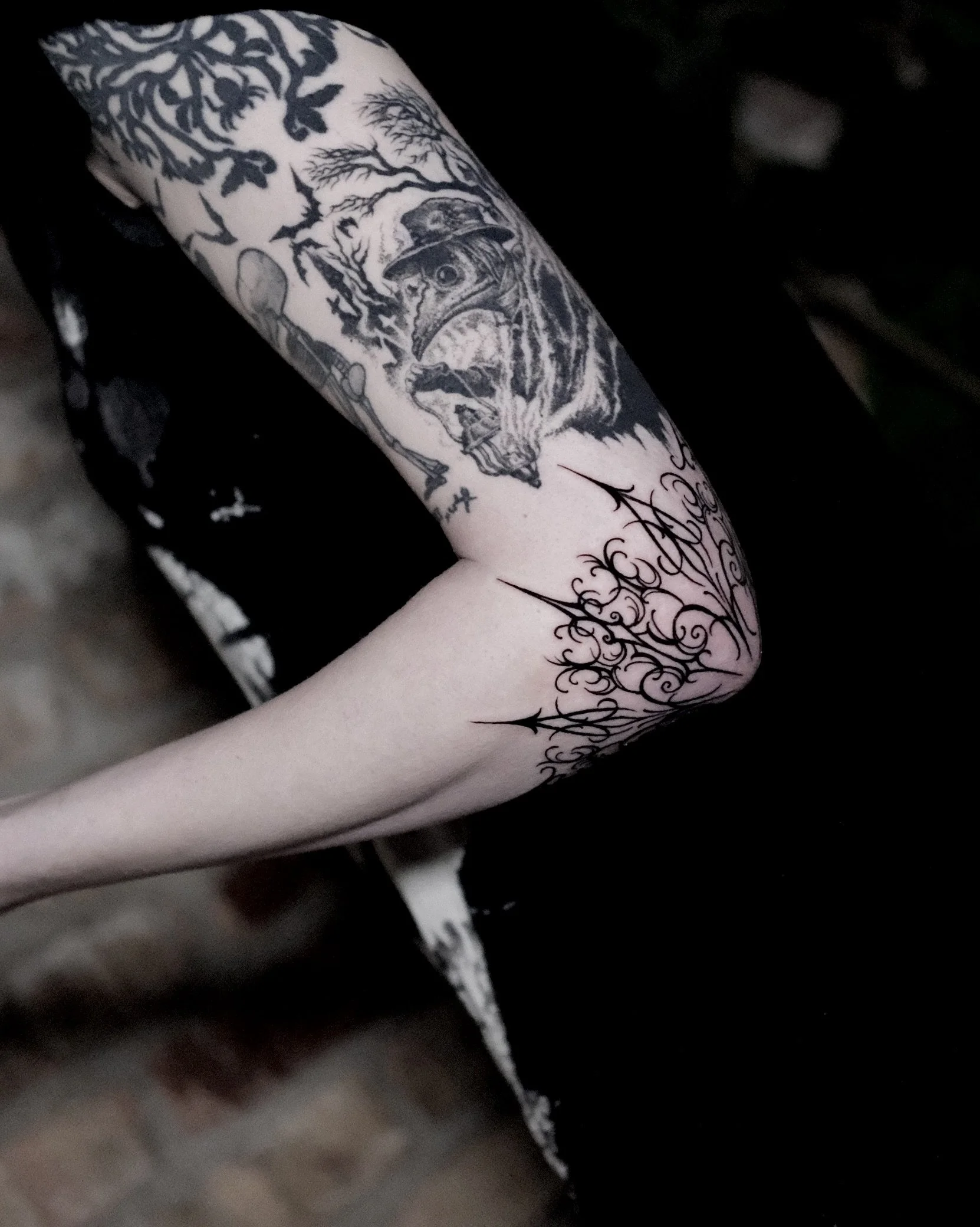 gothic spike elbow tattoo 