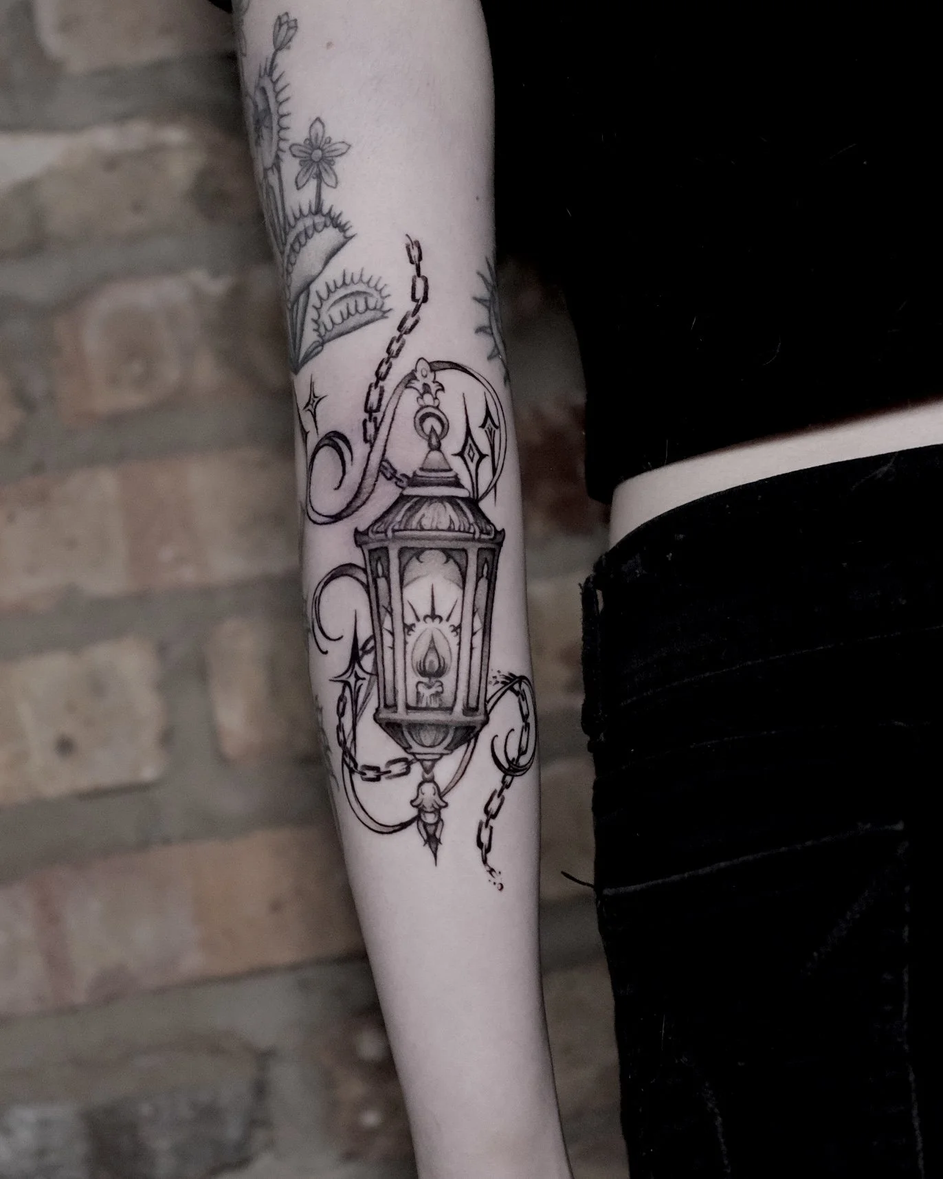 light chain work lantern tattoo with stars