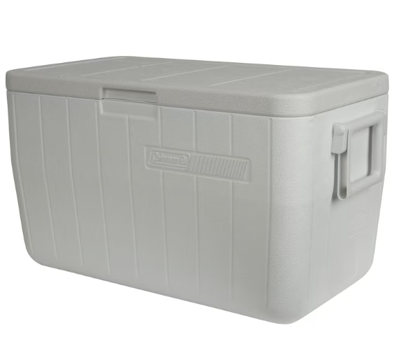 A white Coleman cooler with a lid and handle.