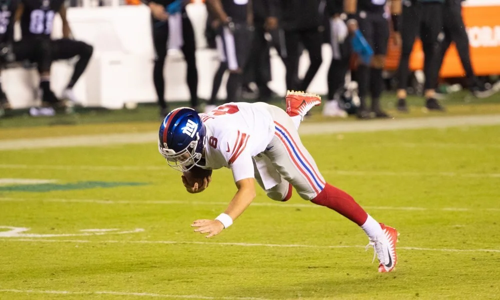 Daniel Jones falls down untouched against the Eagles. (USA TODAY Sports)
