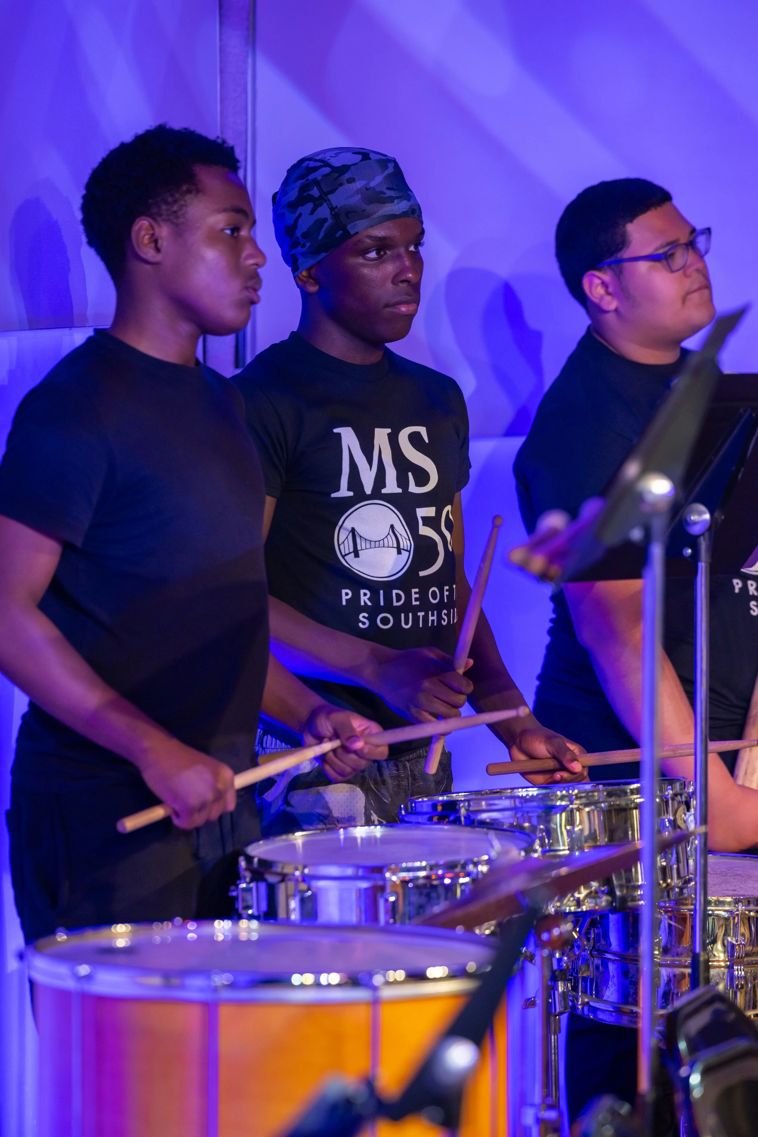 middle school students perform in band concert