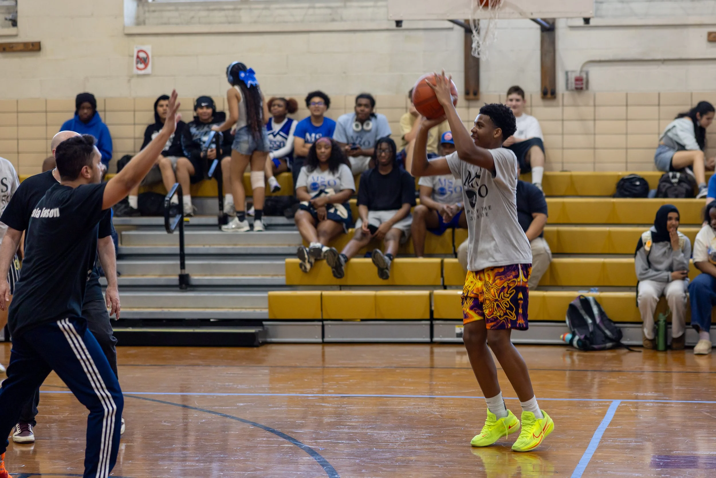 student versus staff basketball game