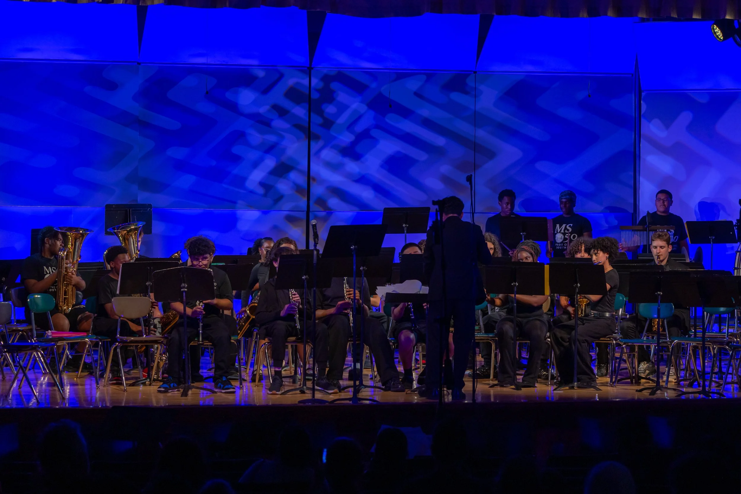middle school students perform in band concert