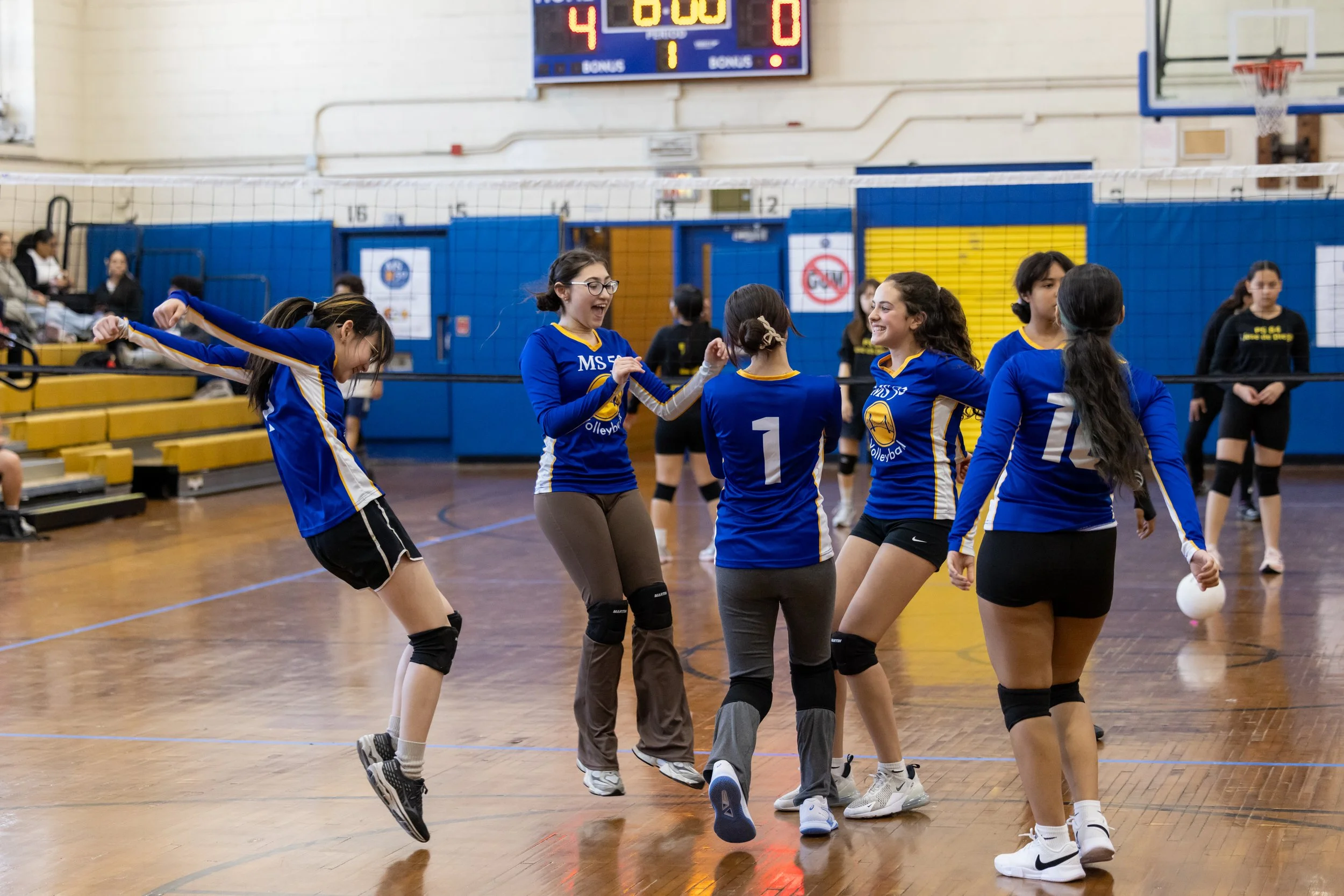 MS 50 students playing volleyball