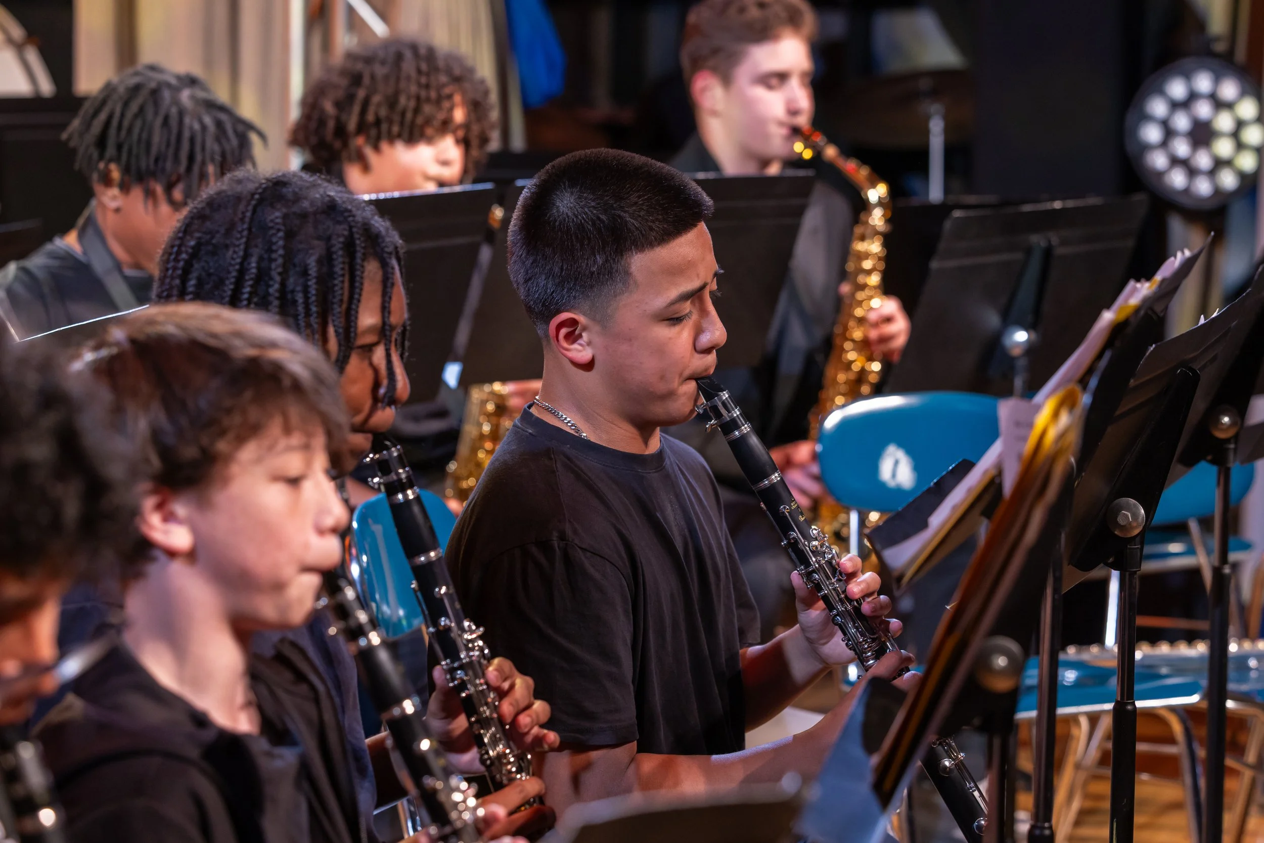 middle school students perform in band concert