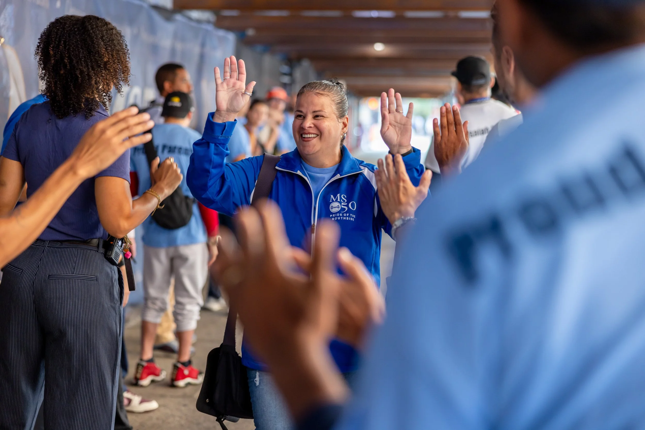 Students get high fives from parents