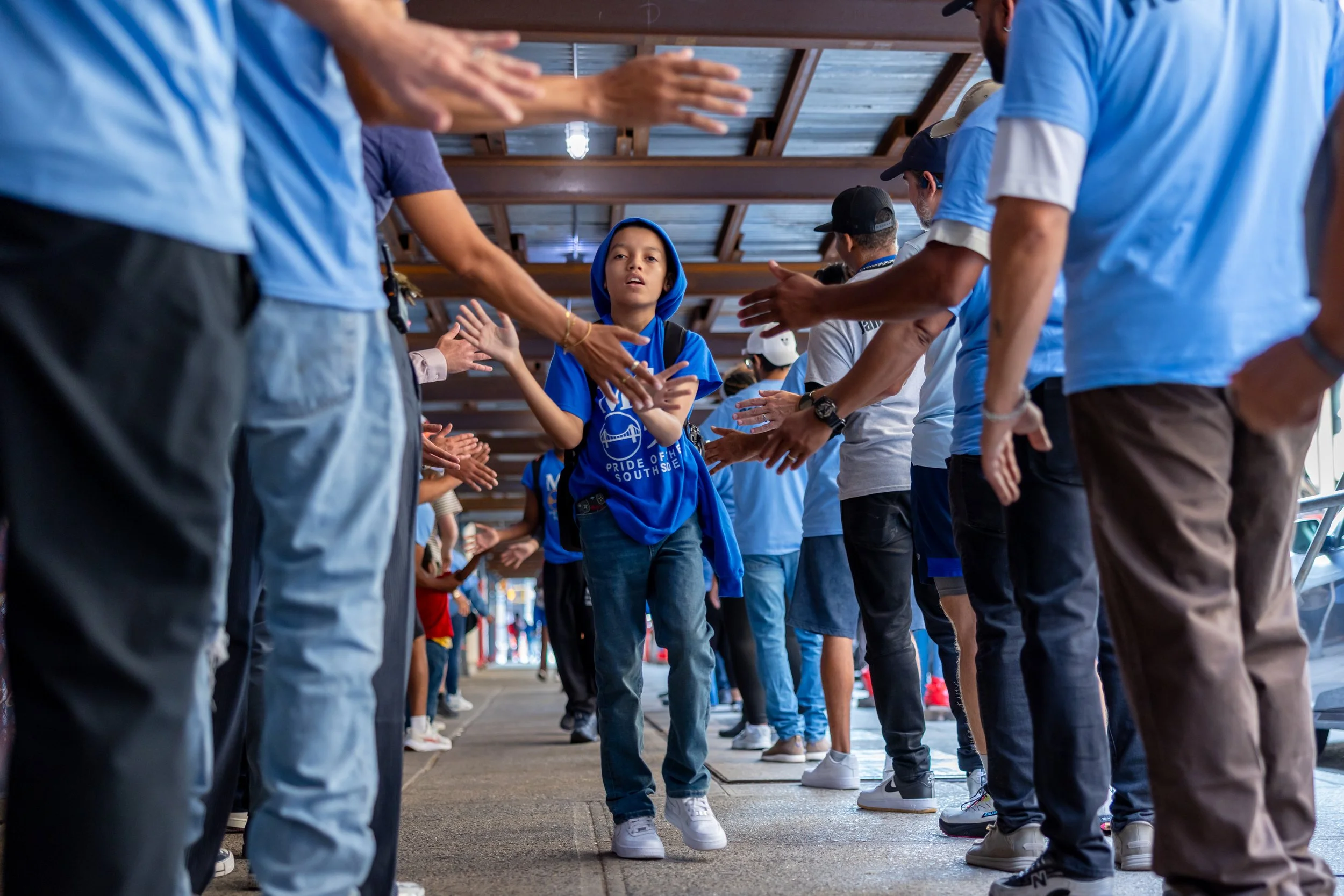 Students get high fives from parents