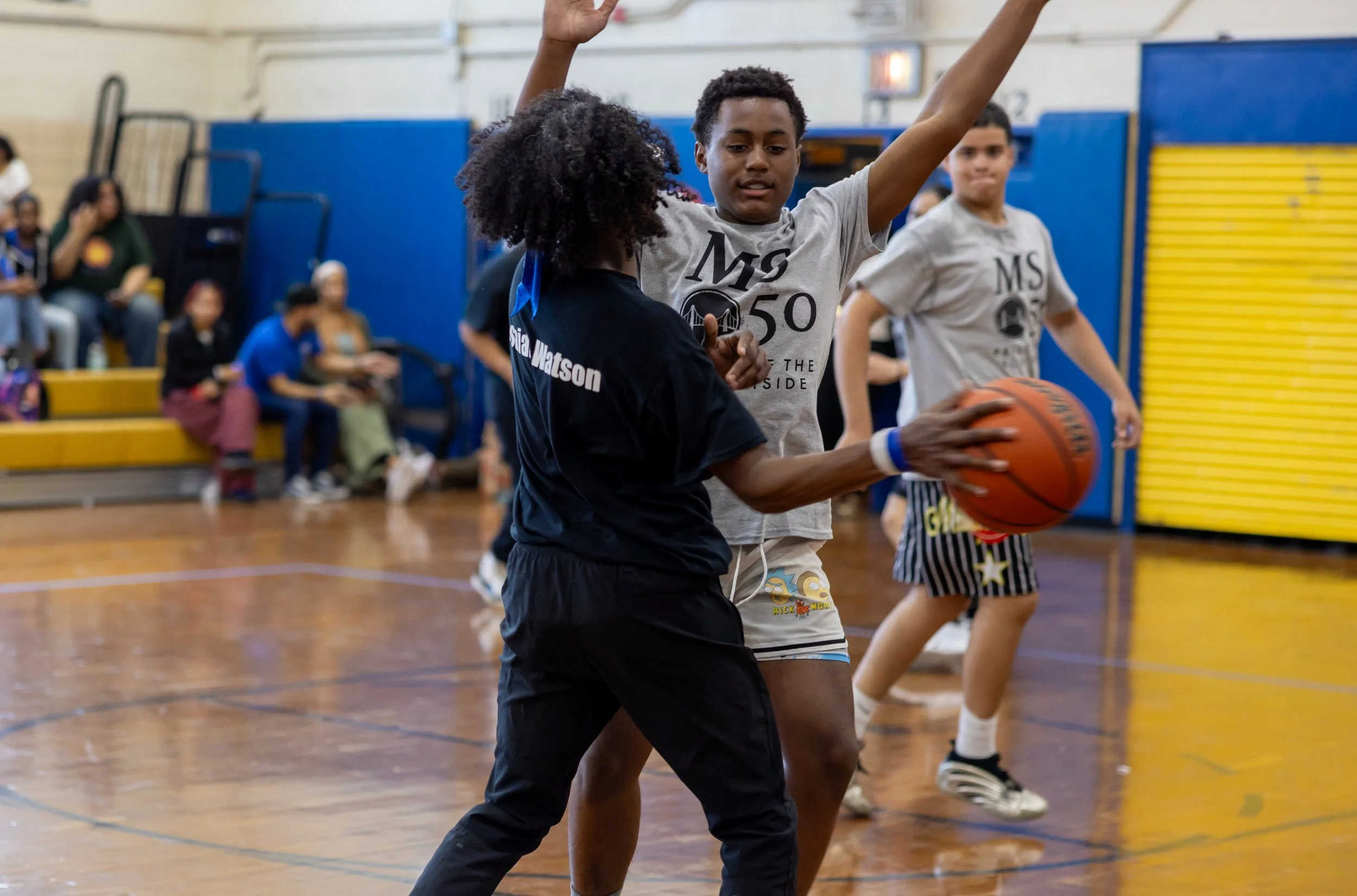 student versus staff basketball game