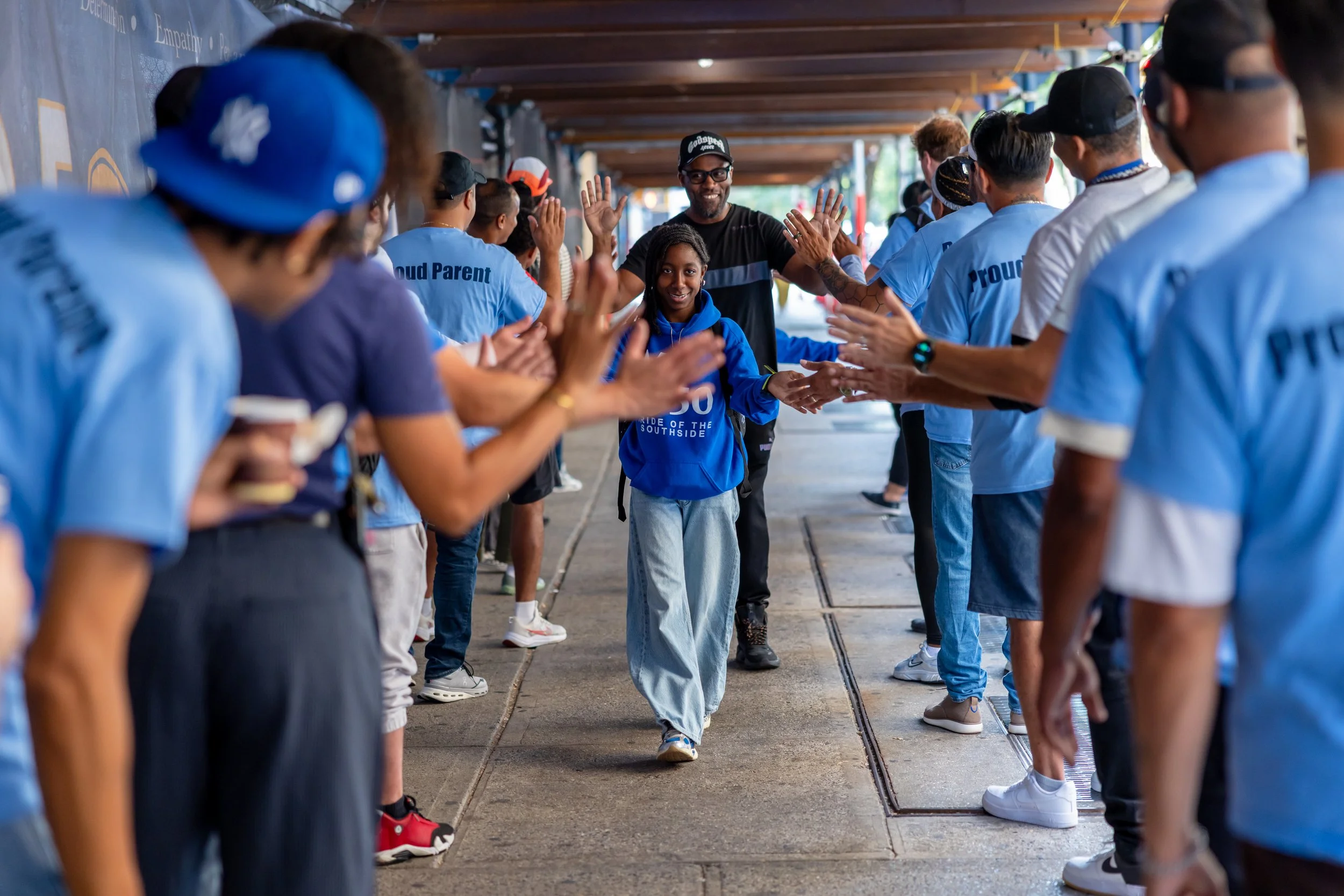 Students get high fives from parents