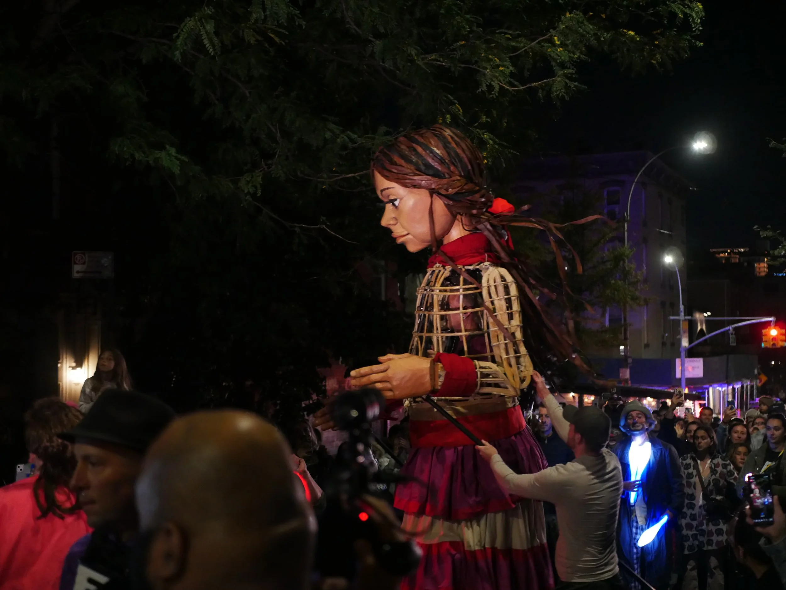 Little Amal from the side