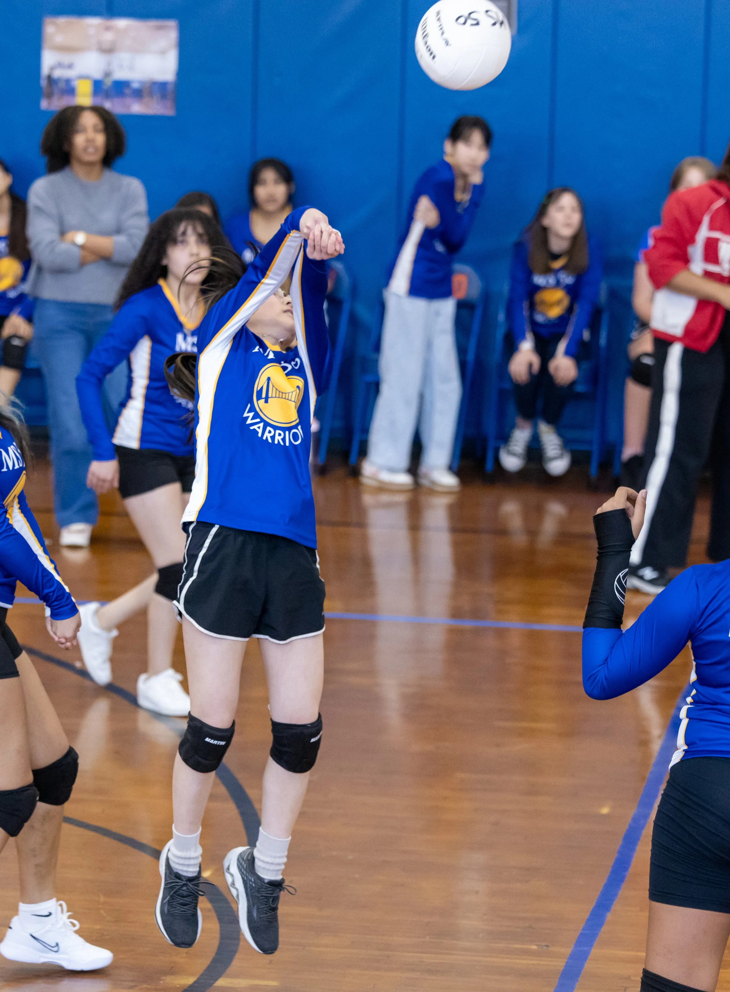 MS 50 students playing volleyball