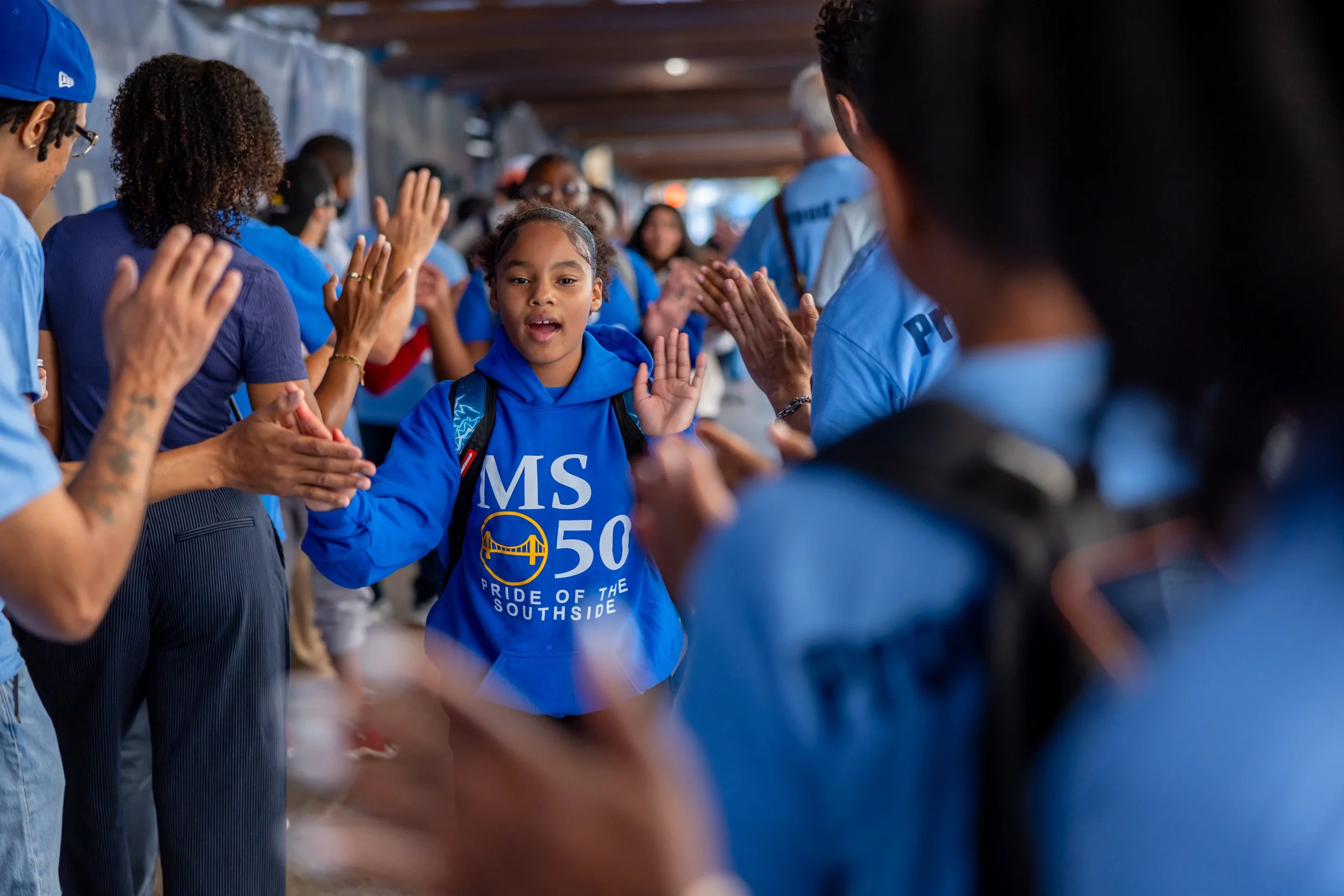 Students get high fives from parents