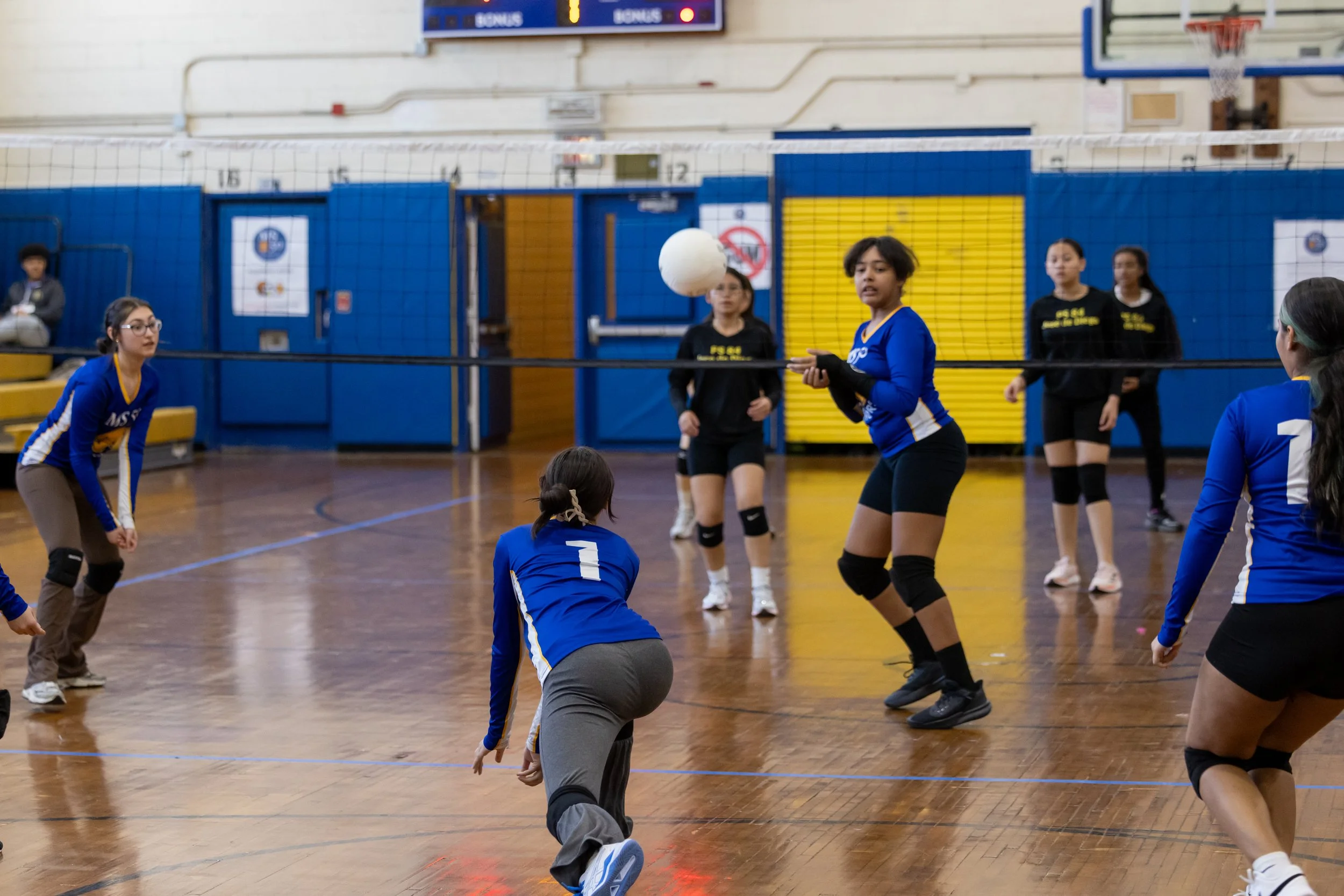 MS 50 students playing volleyball