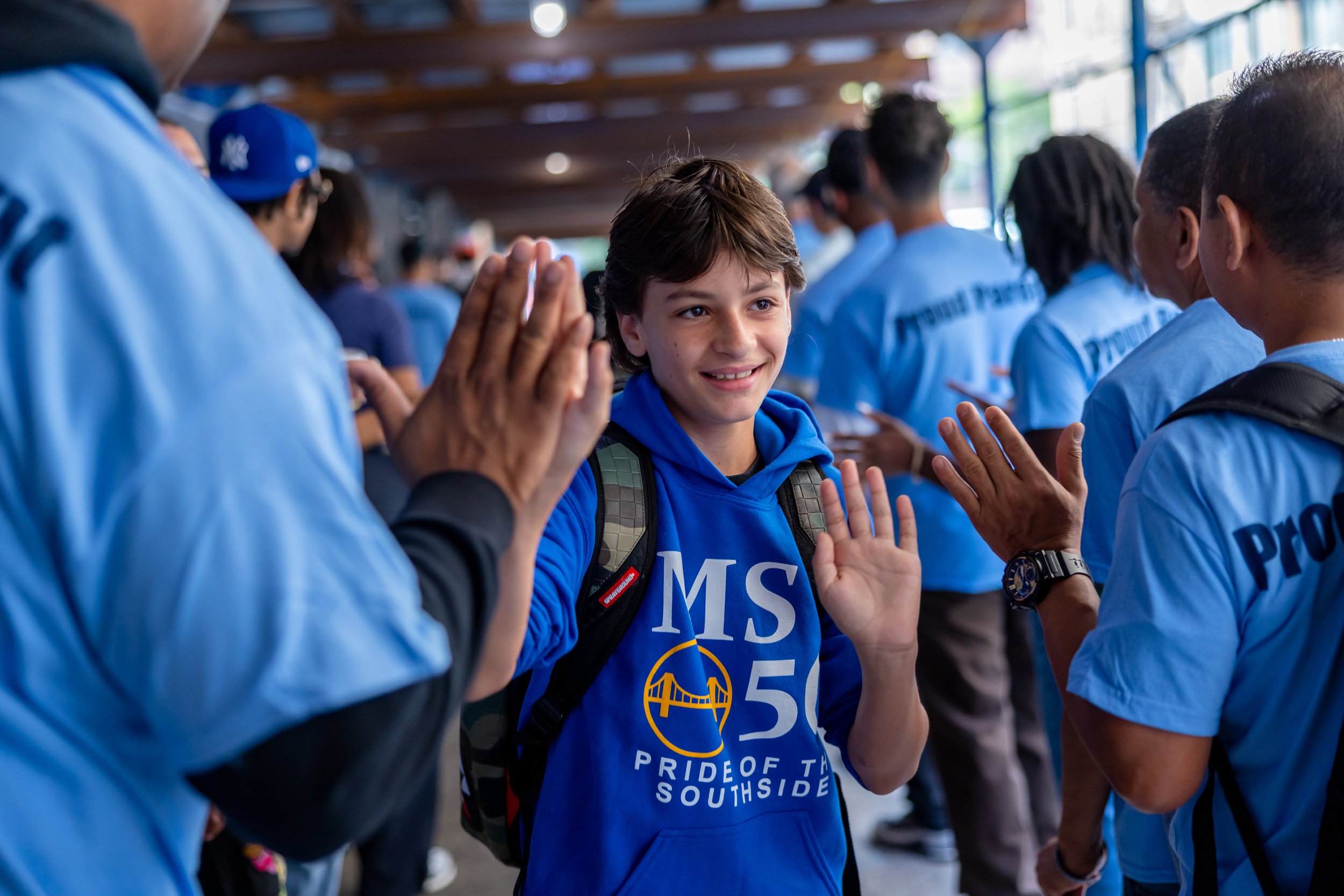 Students get high fives from parents