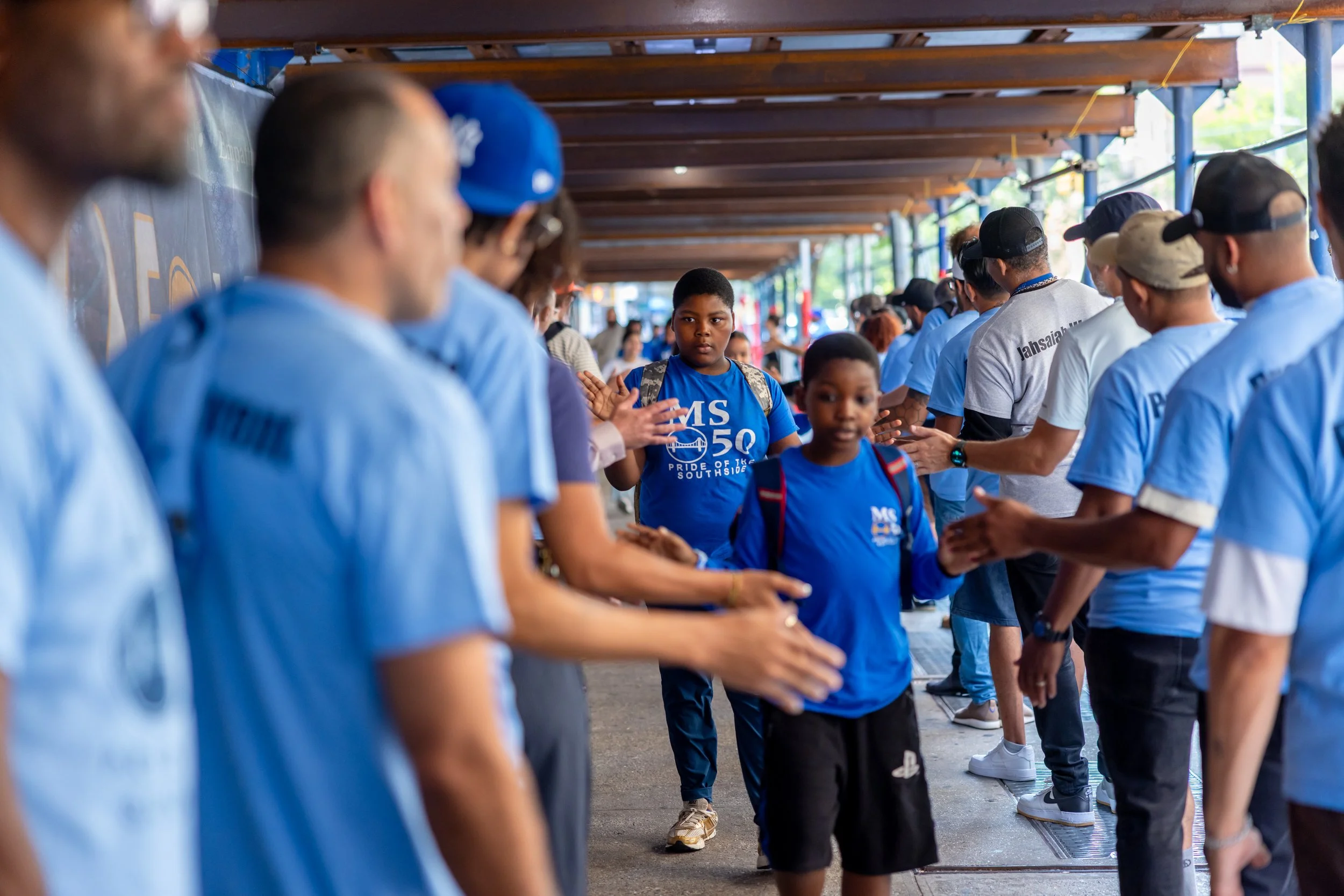 Students get high fives from parents