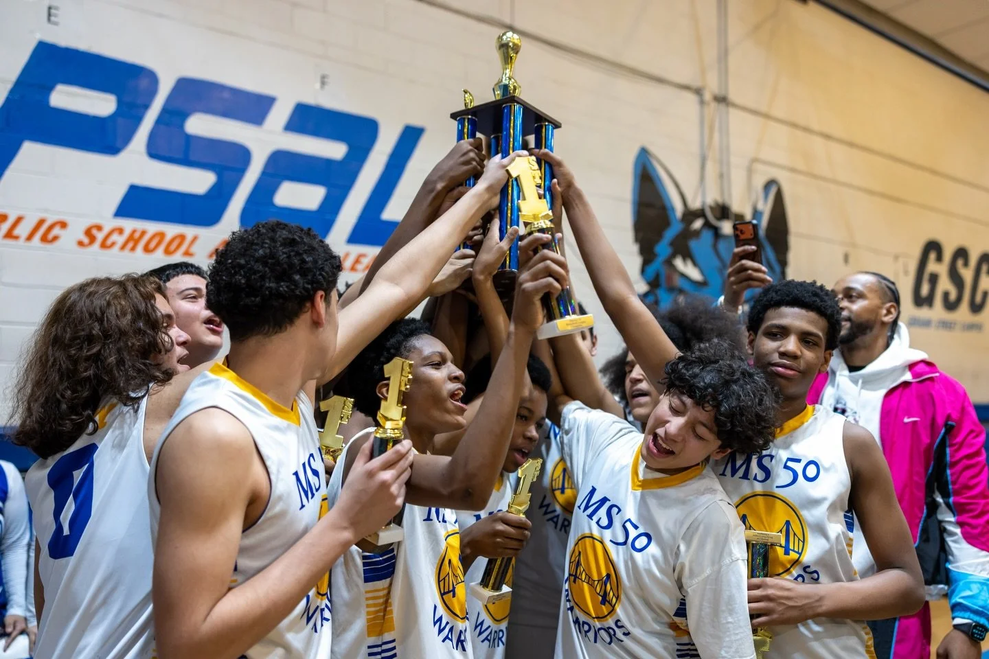 The MS 50 Boys Basketball team is District Champs!! It was an incredible game to cap off a hard fought, undefeated season! We are so proud of the growth as players and young men this whole season. A huge shoutout to the fans that showed up to cheer o