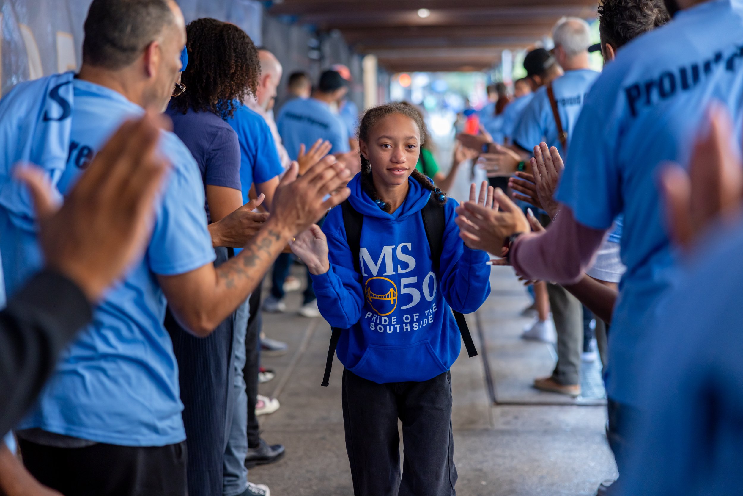 Students get high fives from parents