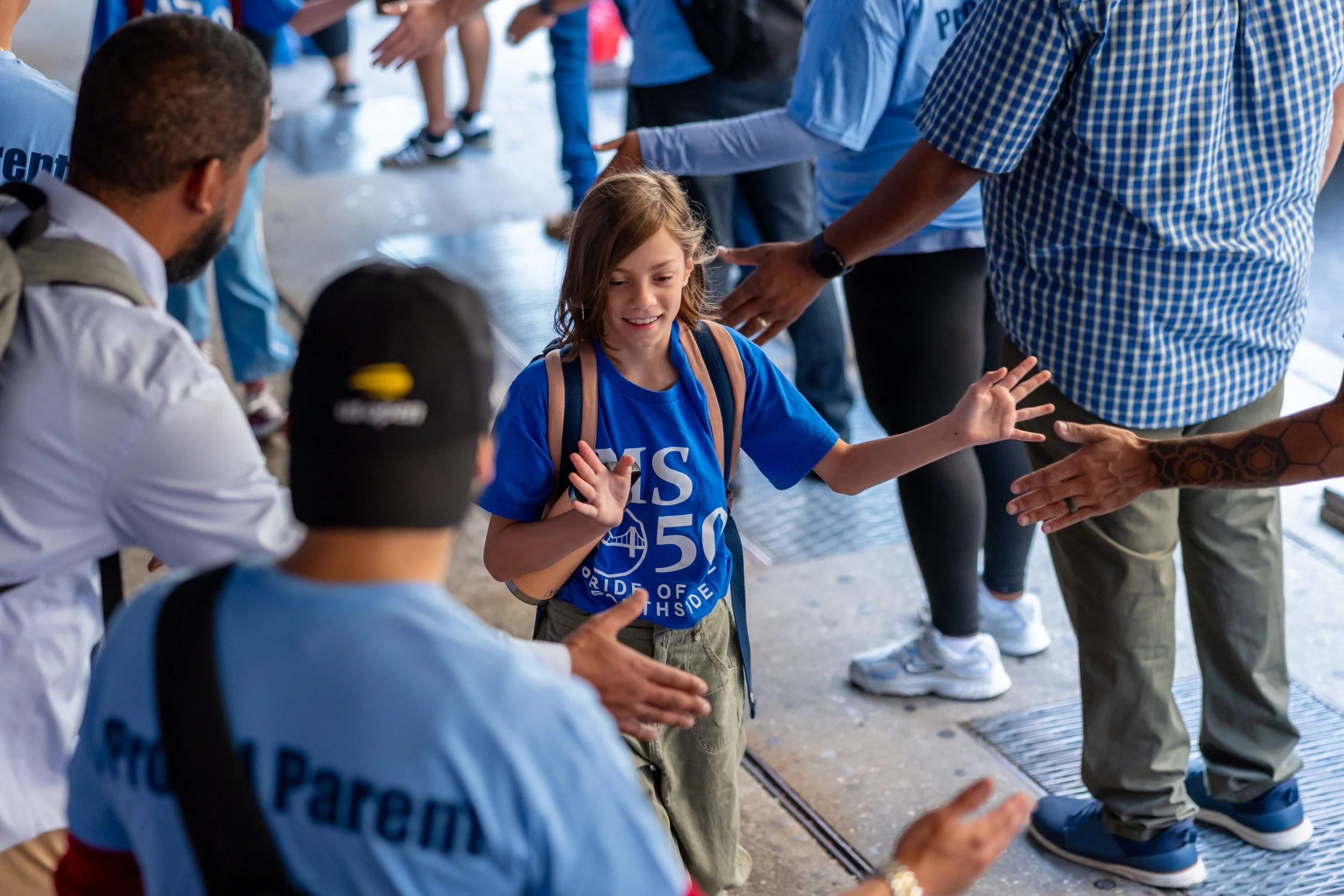 Students get high fives from parents
