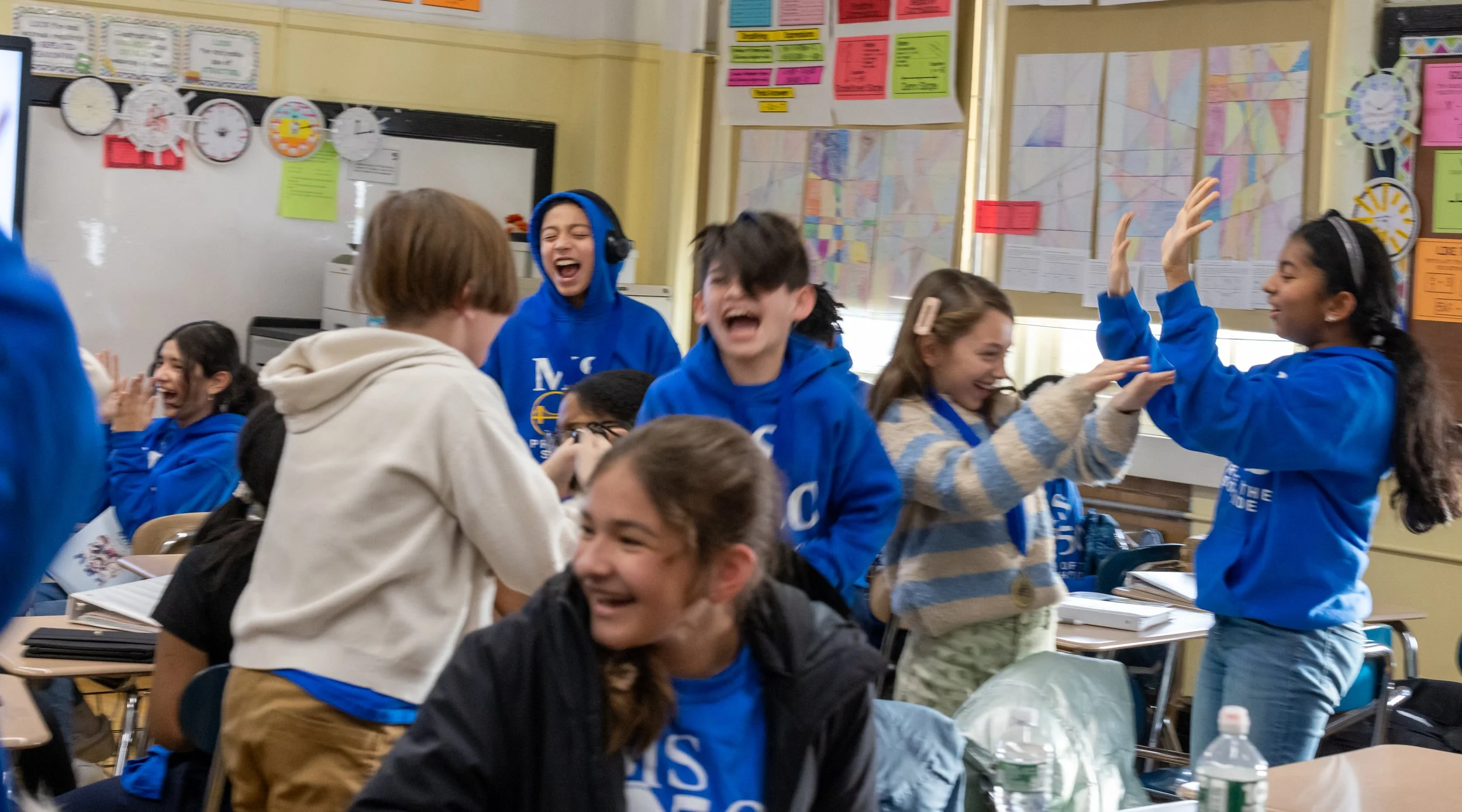 Debaters celebrate their wins