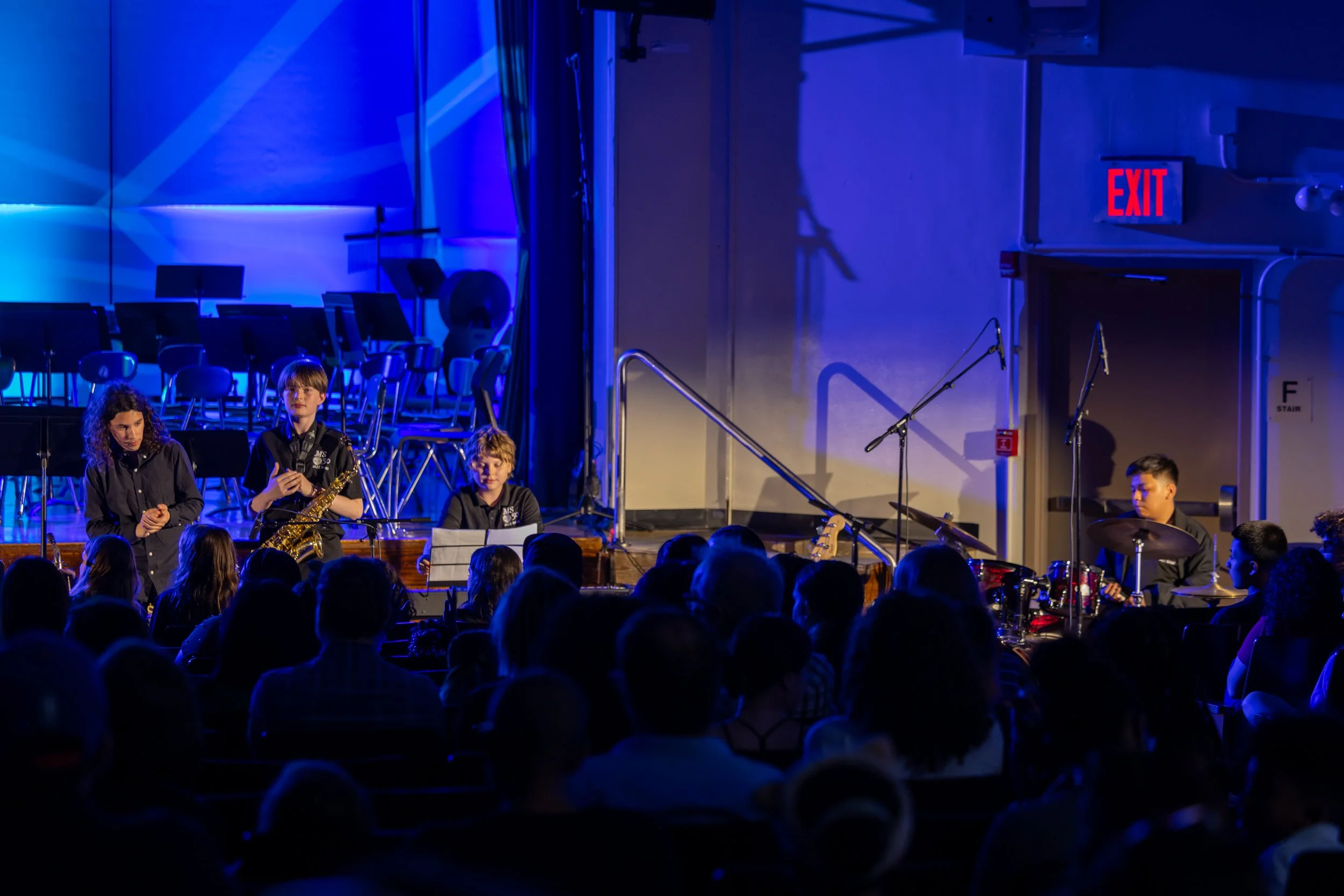 middle school students perform in band concert