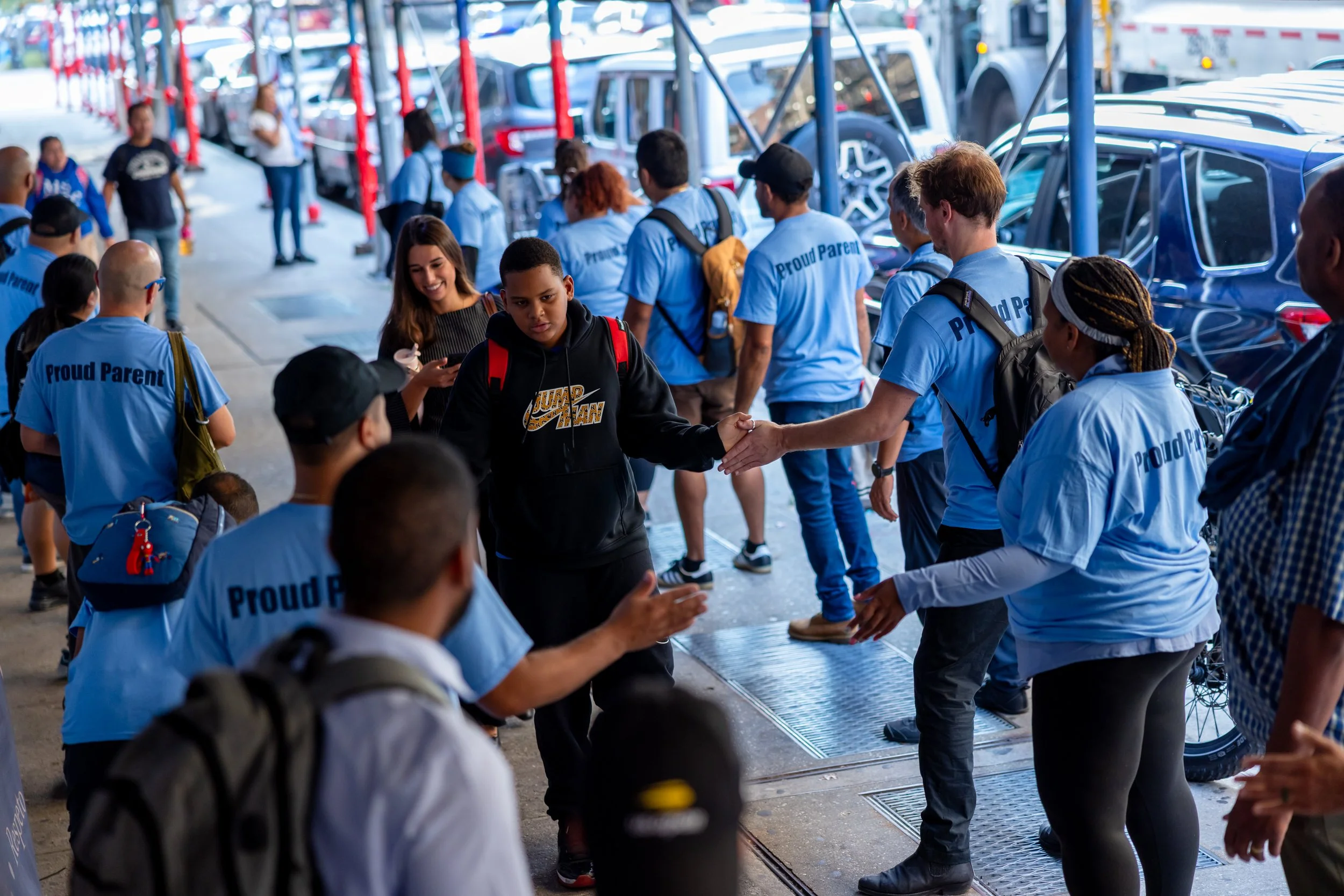 Students get high fives from parents