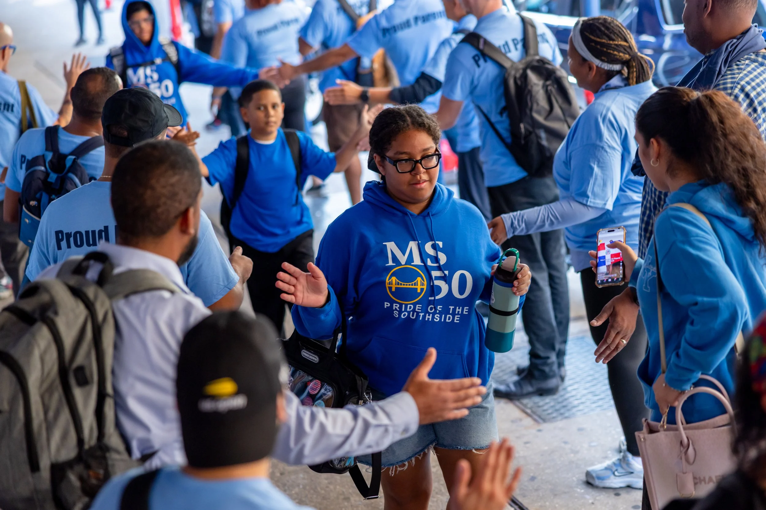 Students get high fives from parents