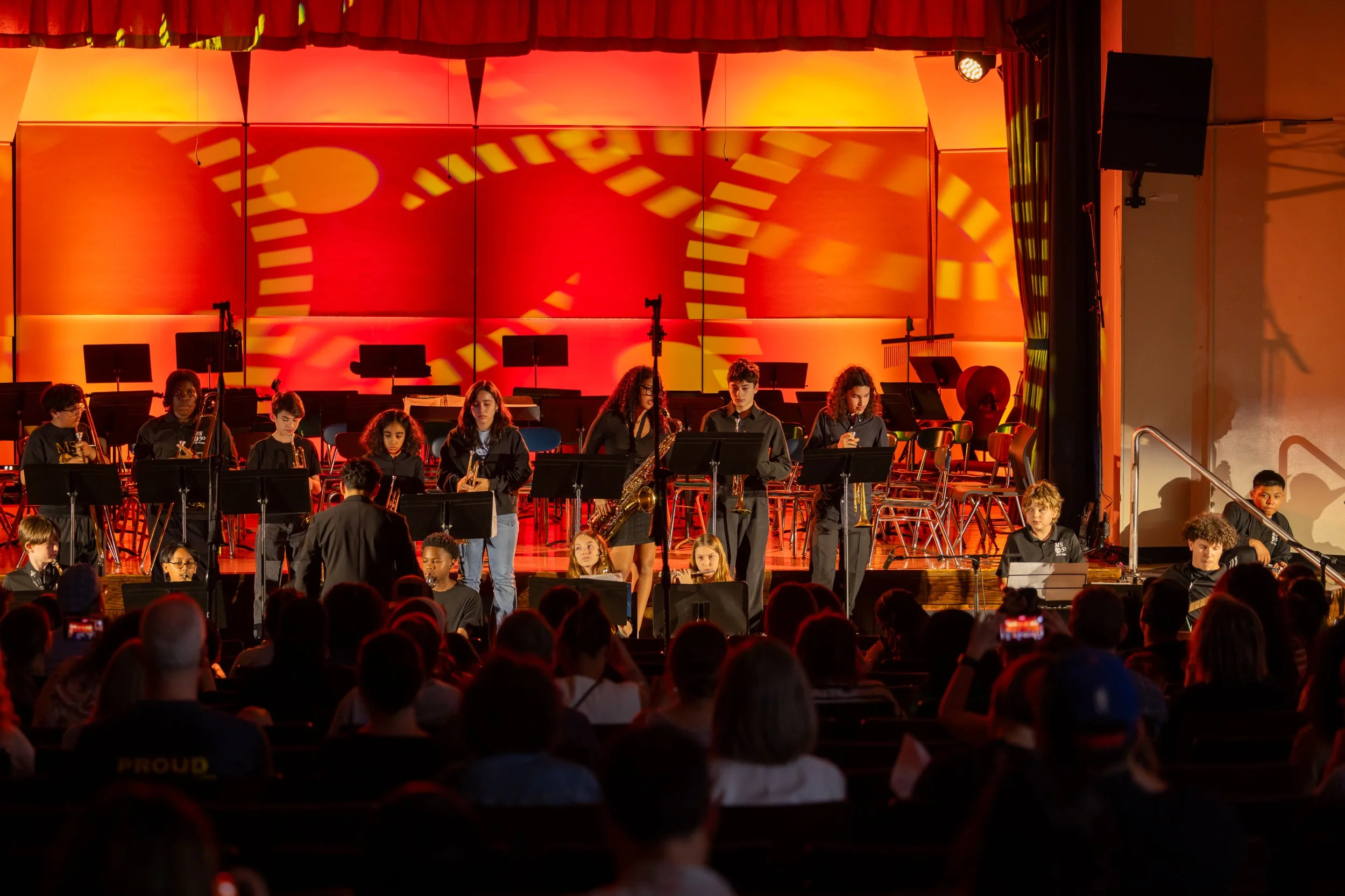 middle school students perform in band concert