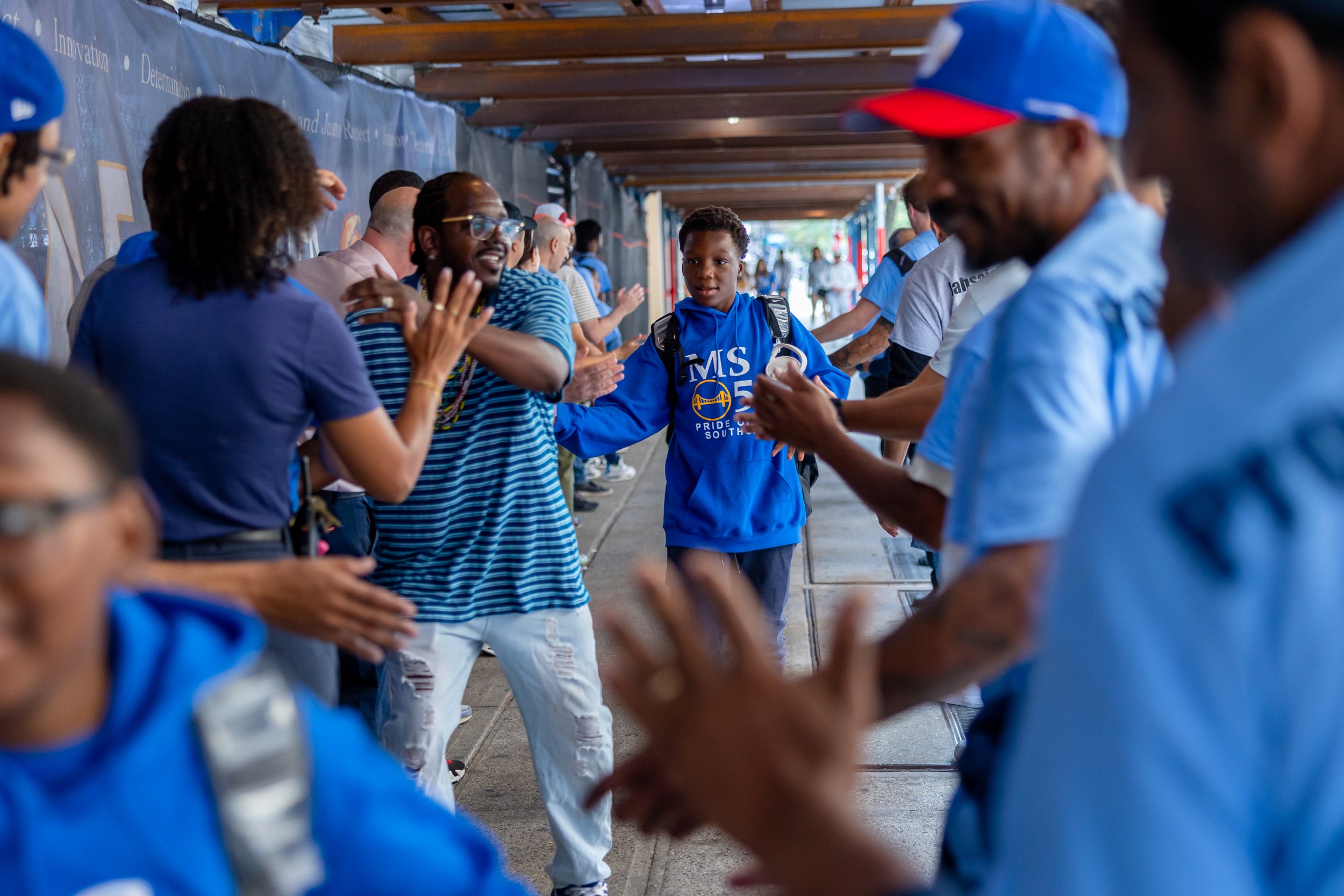 Students get high fives from parents