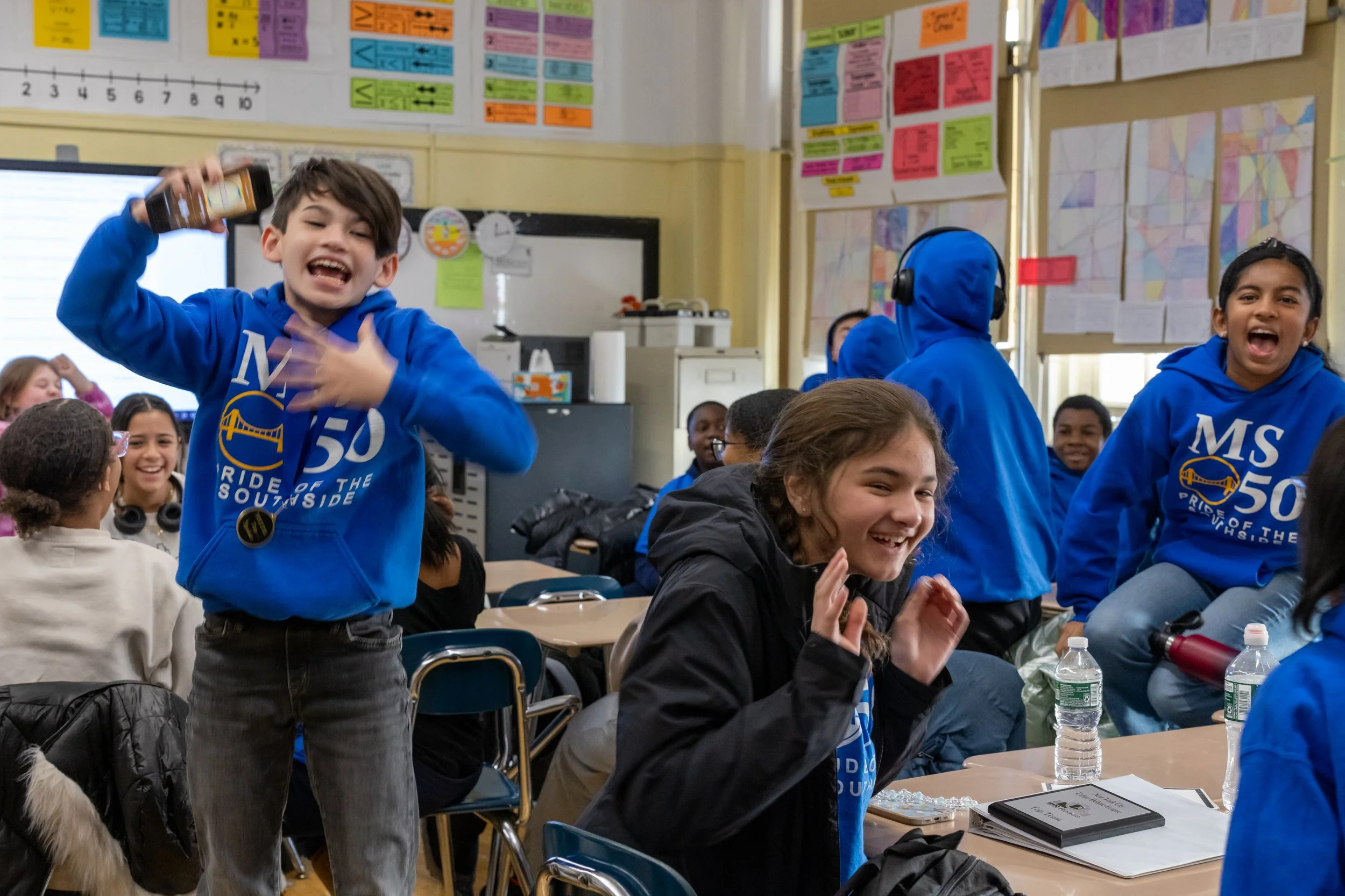 Debaters celebrate their wins
