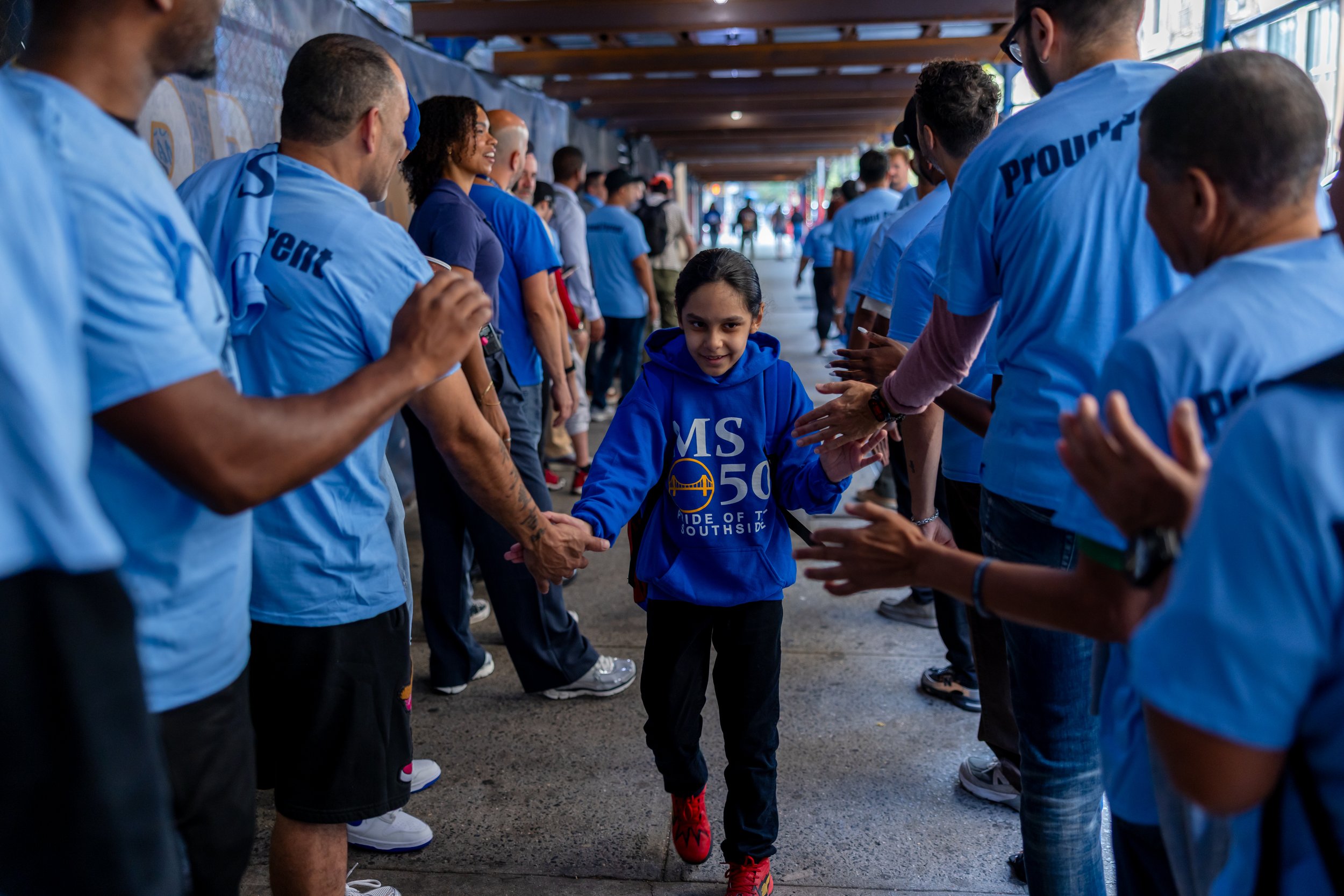 Students get high fives from parents