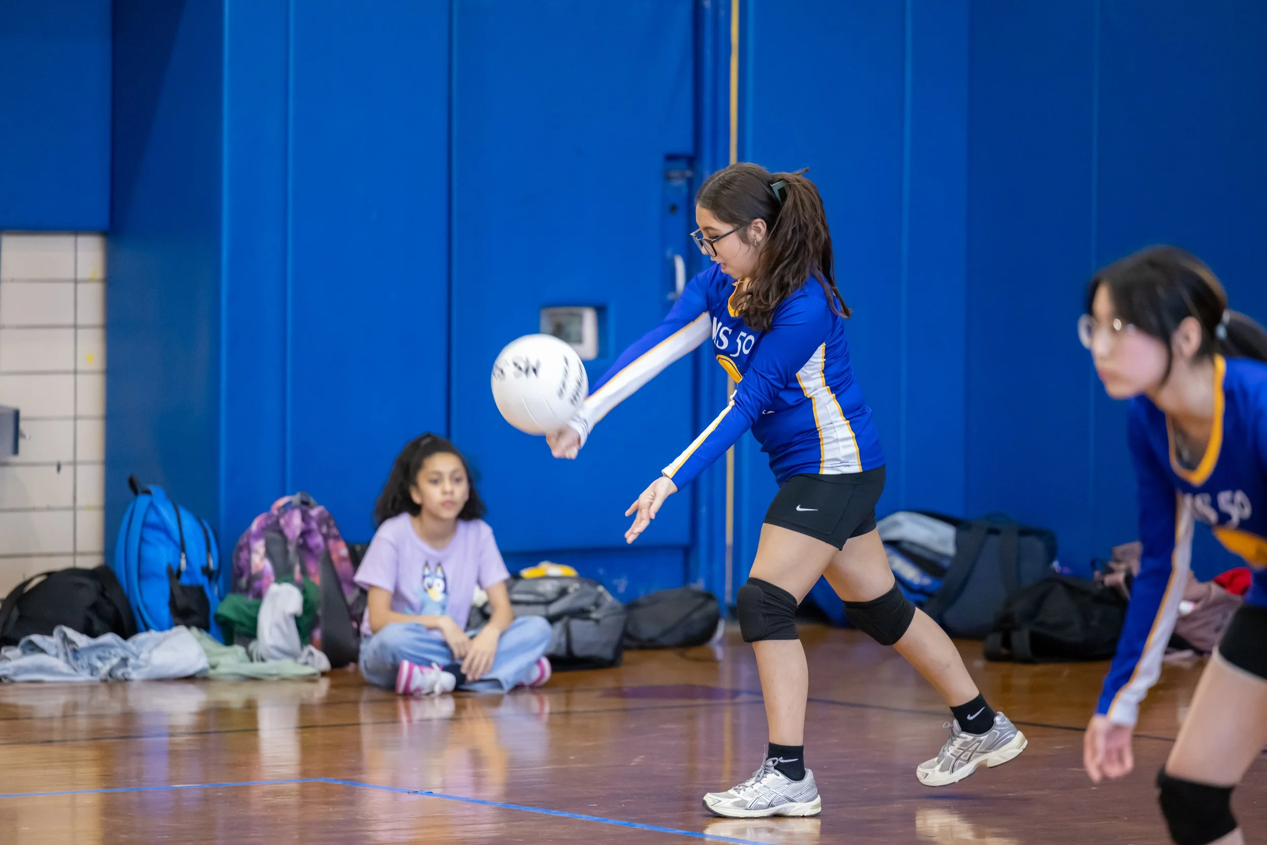 MS 50 students playing volleyball