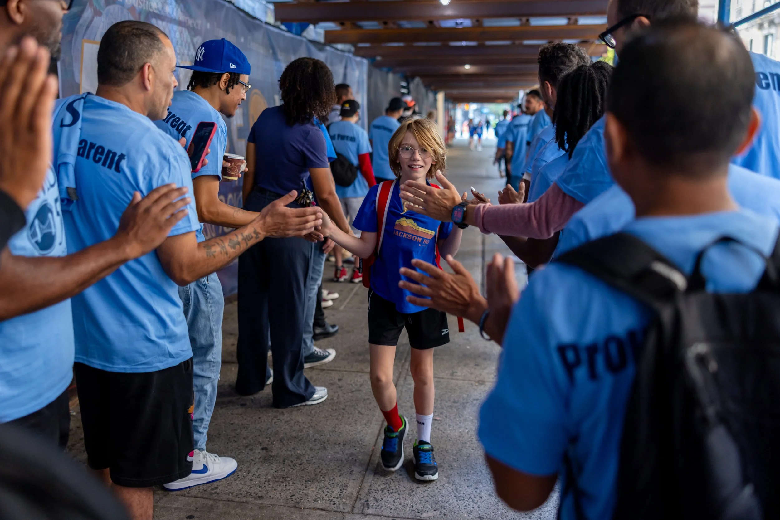 Students get high fives from parents