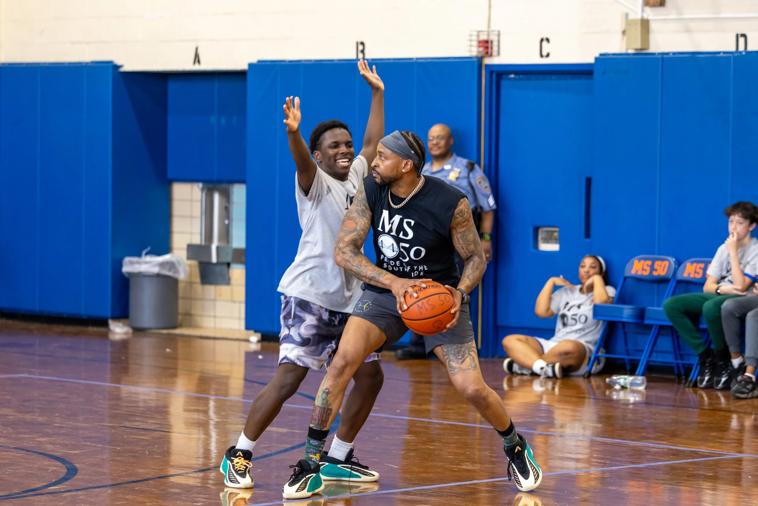 student versus staff basketball game