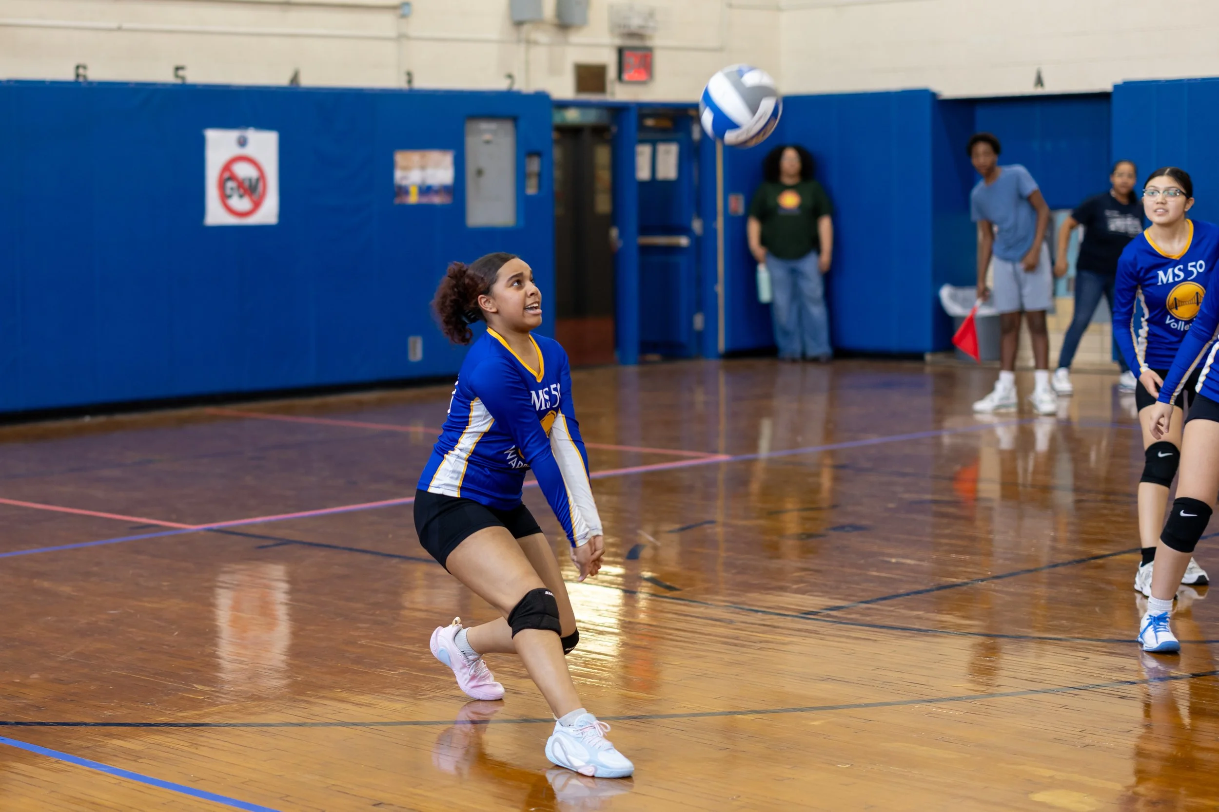 Students playing volleyball