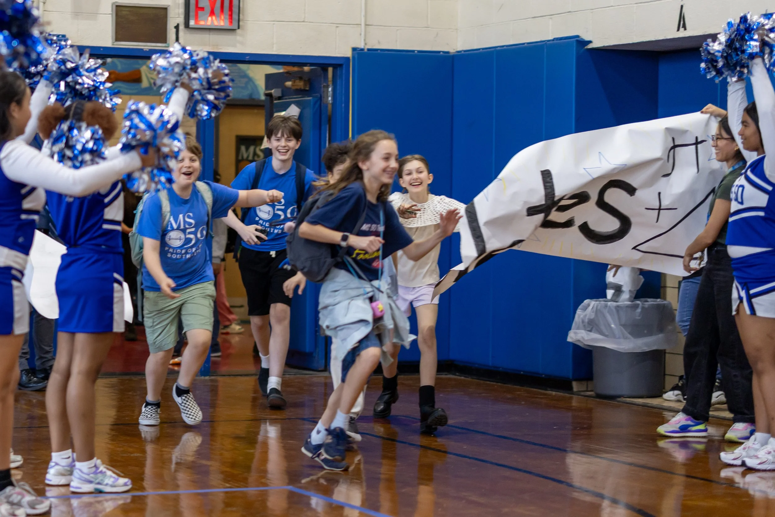 Pep rally banner run through