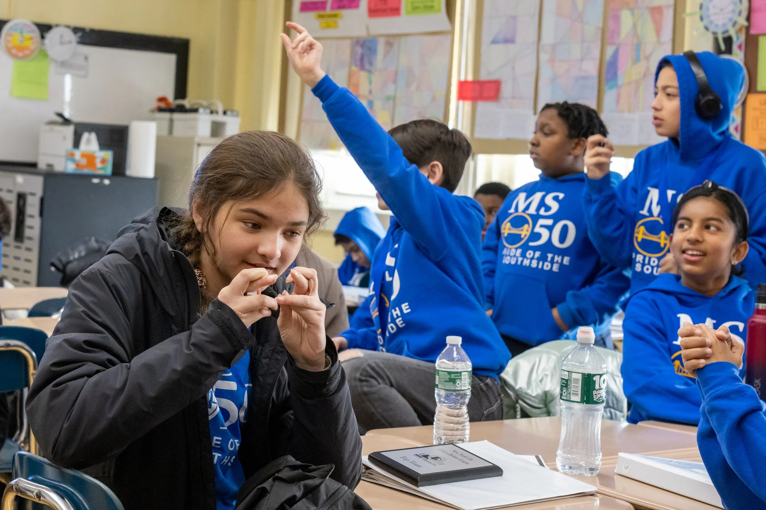 Debaters celebrate their wins