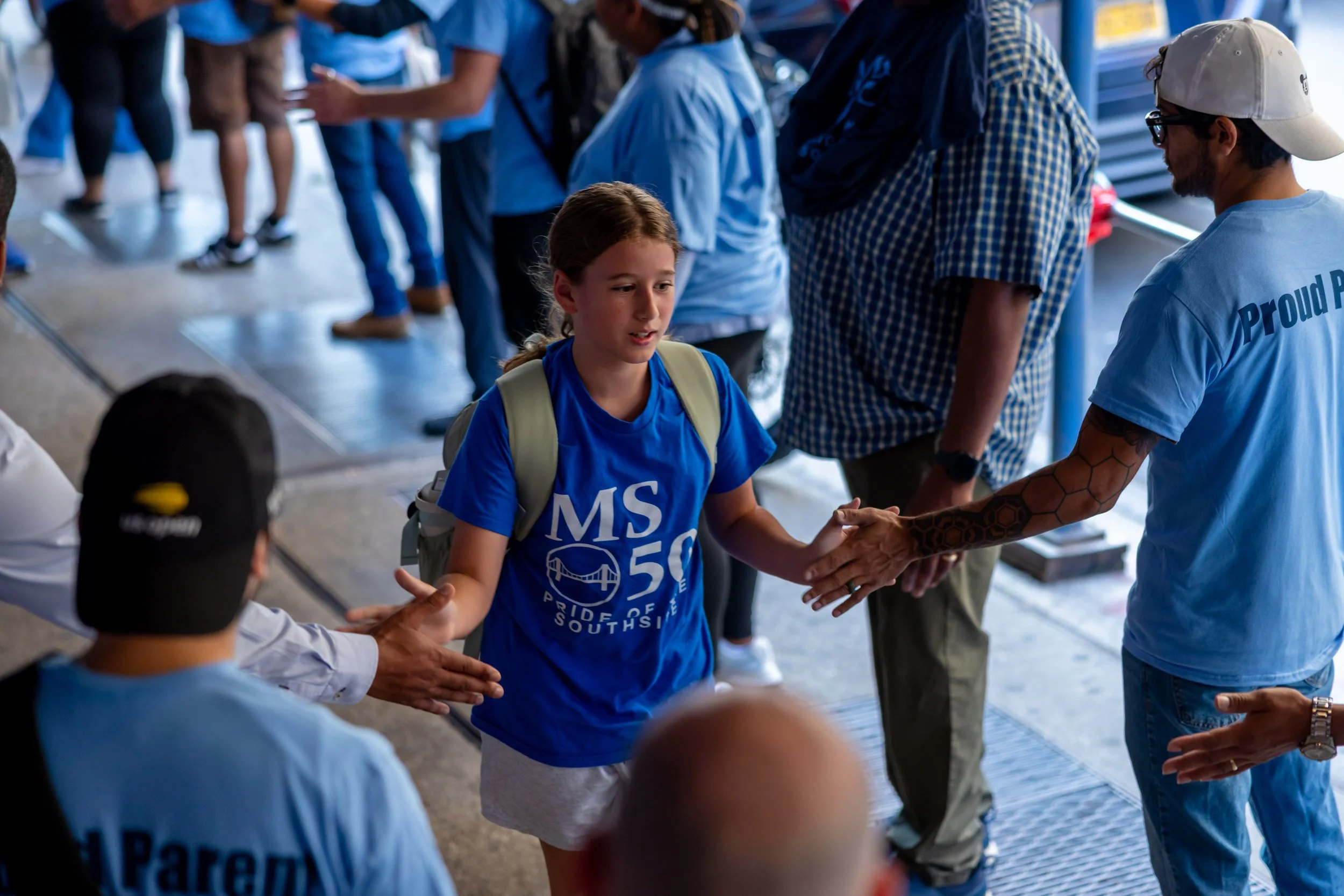 Students get high fives from parents