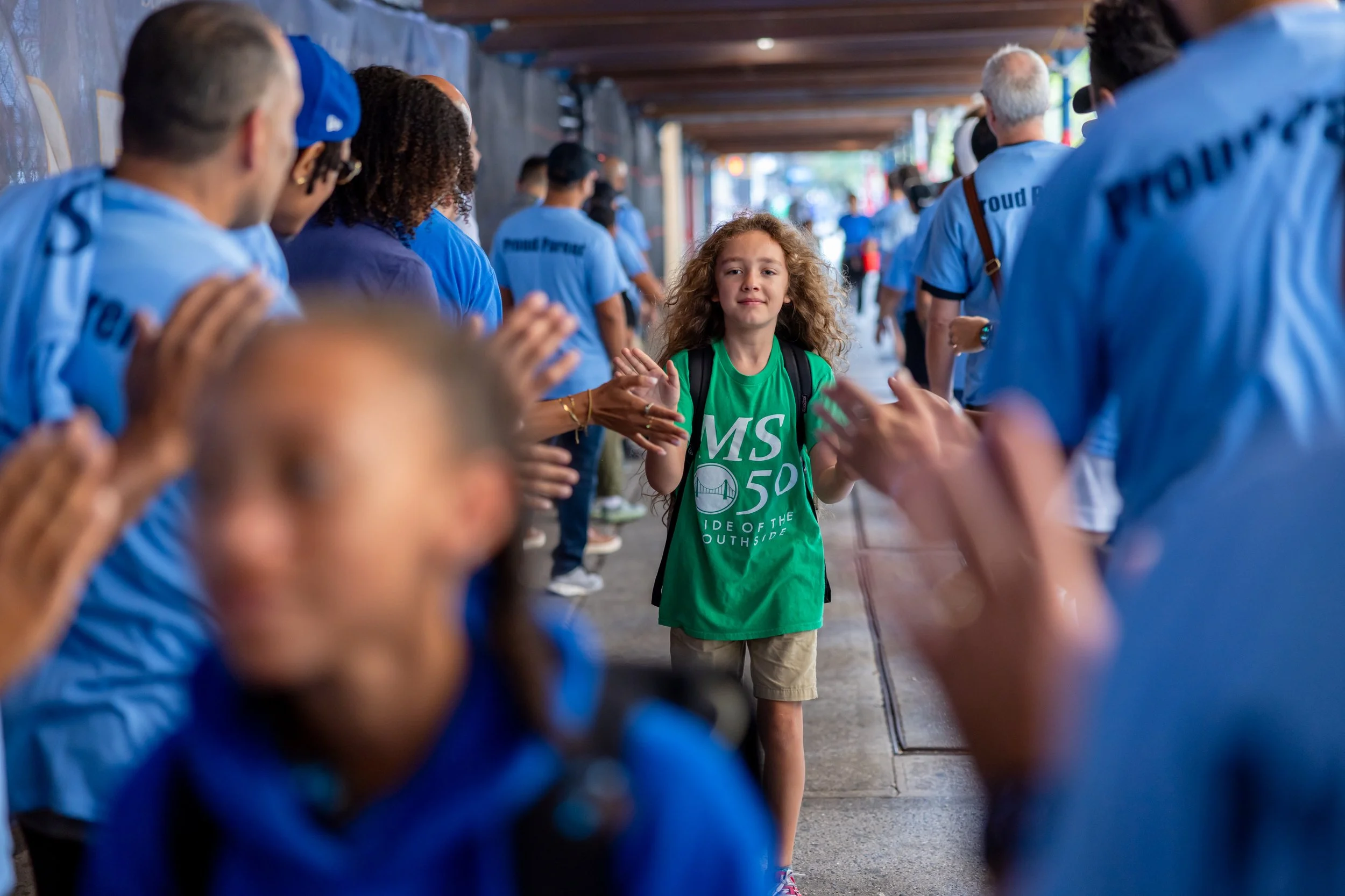 Students get high fives from parents