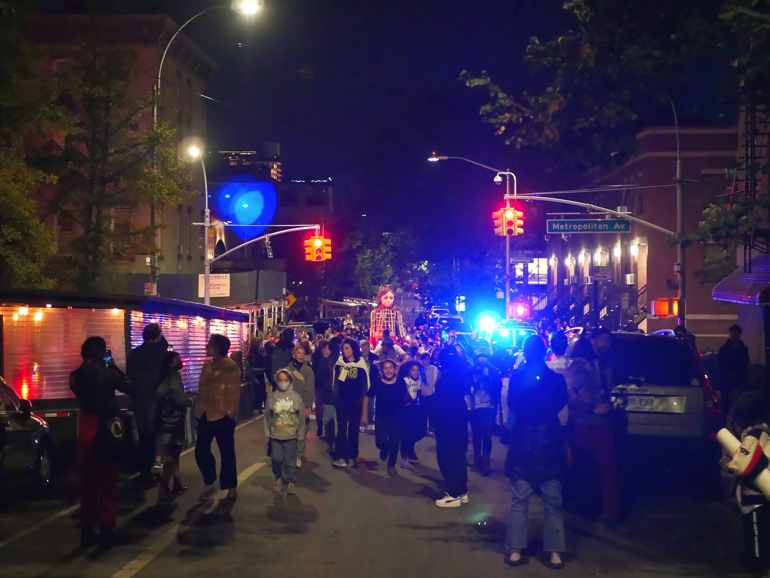 Little Amal walks down Berry St