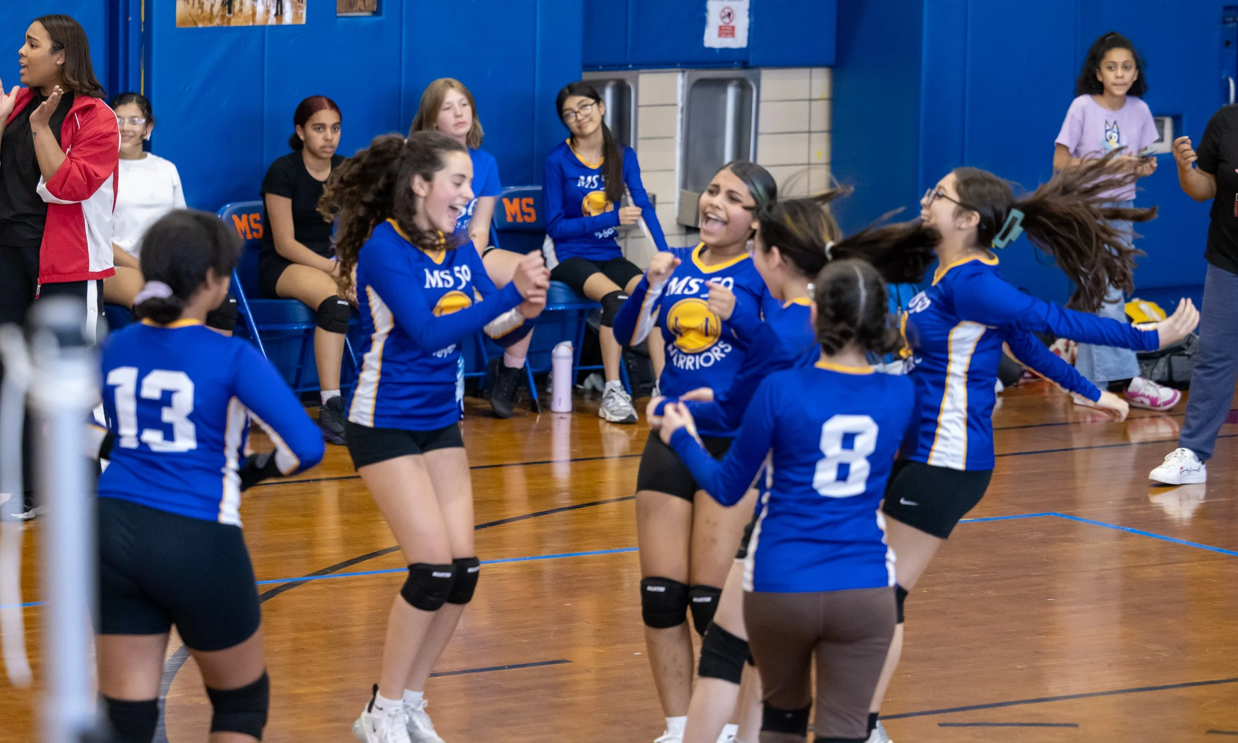MS 50 students playing volleyball